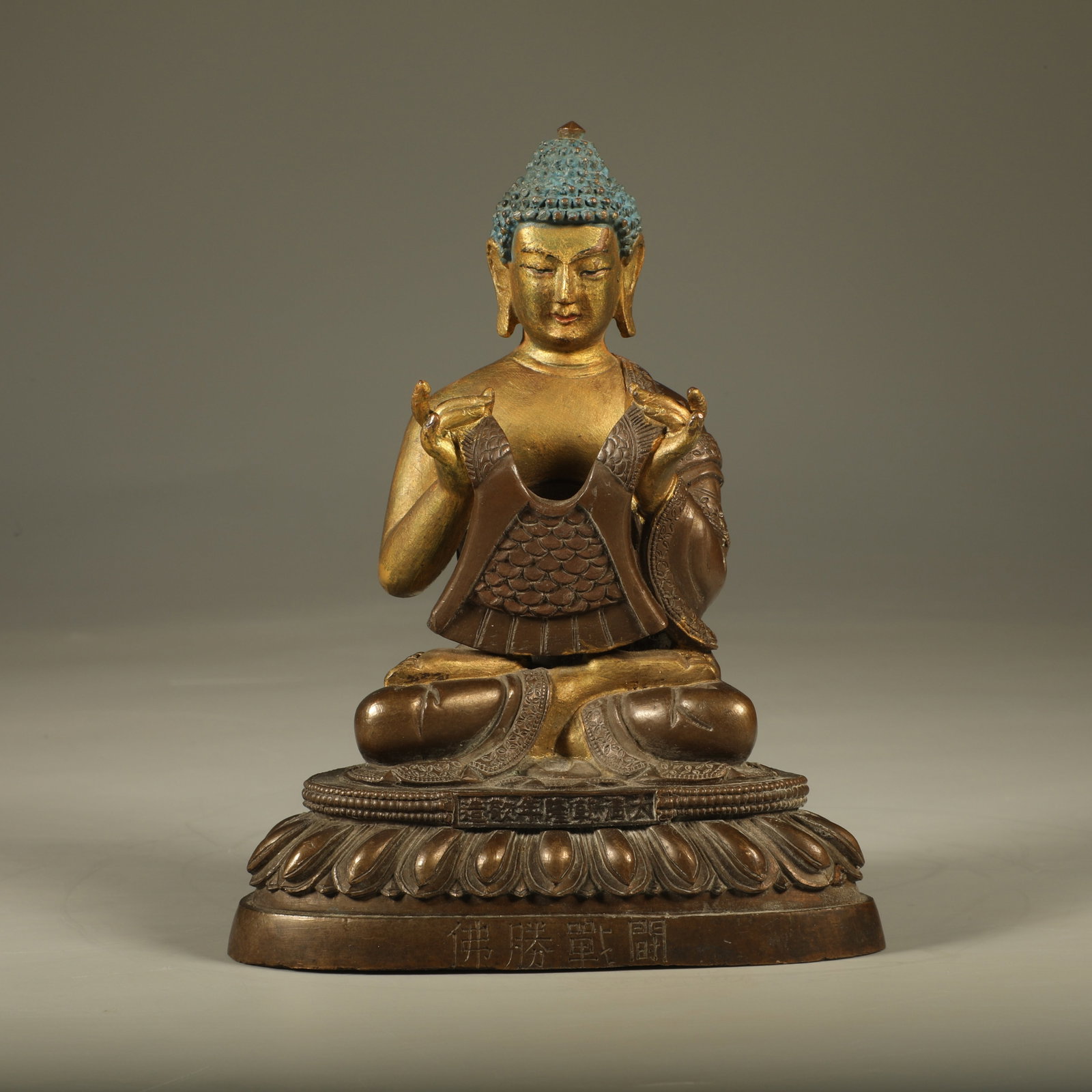 A GILT BRONZE STATUE OF DIPANKARA BUDDHA: Gilt Bronze Statue of Dipankara Buddha