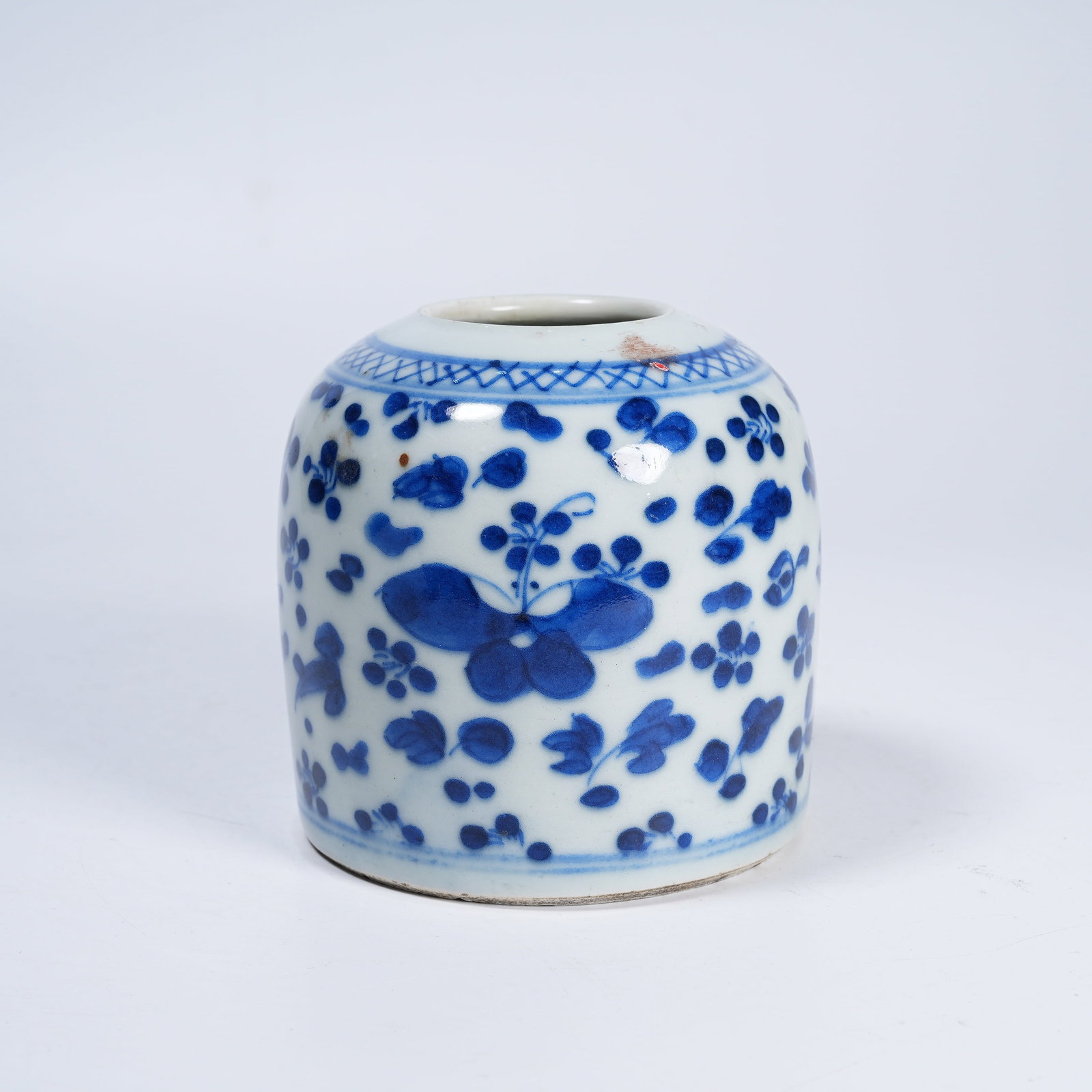 A BLUE AND WHITE HORSESHOE ZUN WITH FLORAL PATTERNS: Blue and White Horseshoe Zun with Floral Patterns