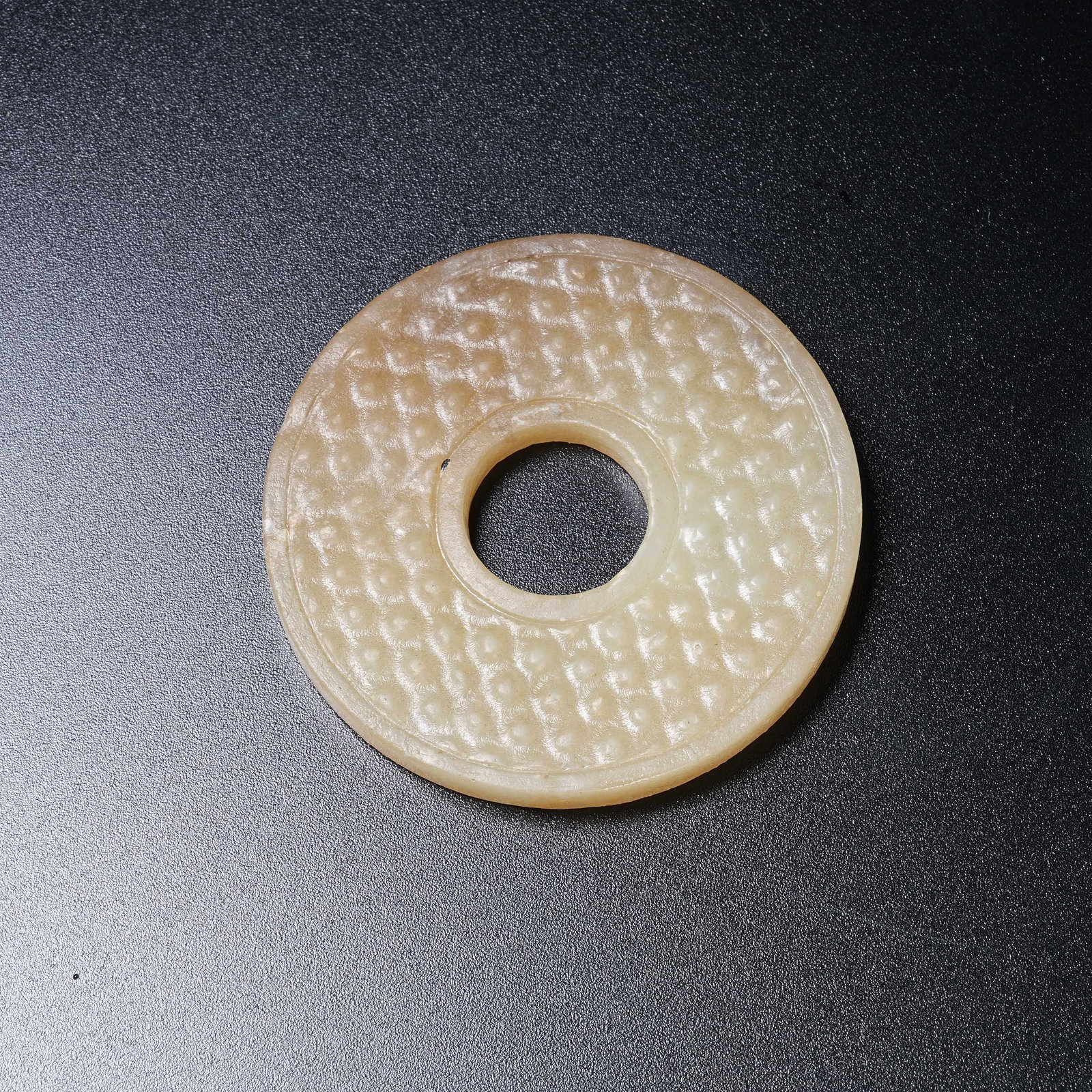 A ANCIENT JADE BI DISC WITH NAIL BOSS MOTIFS (1 of 6)