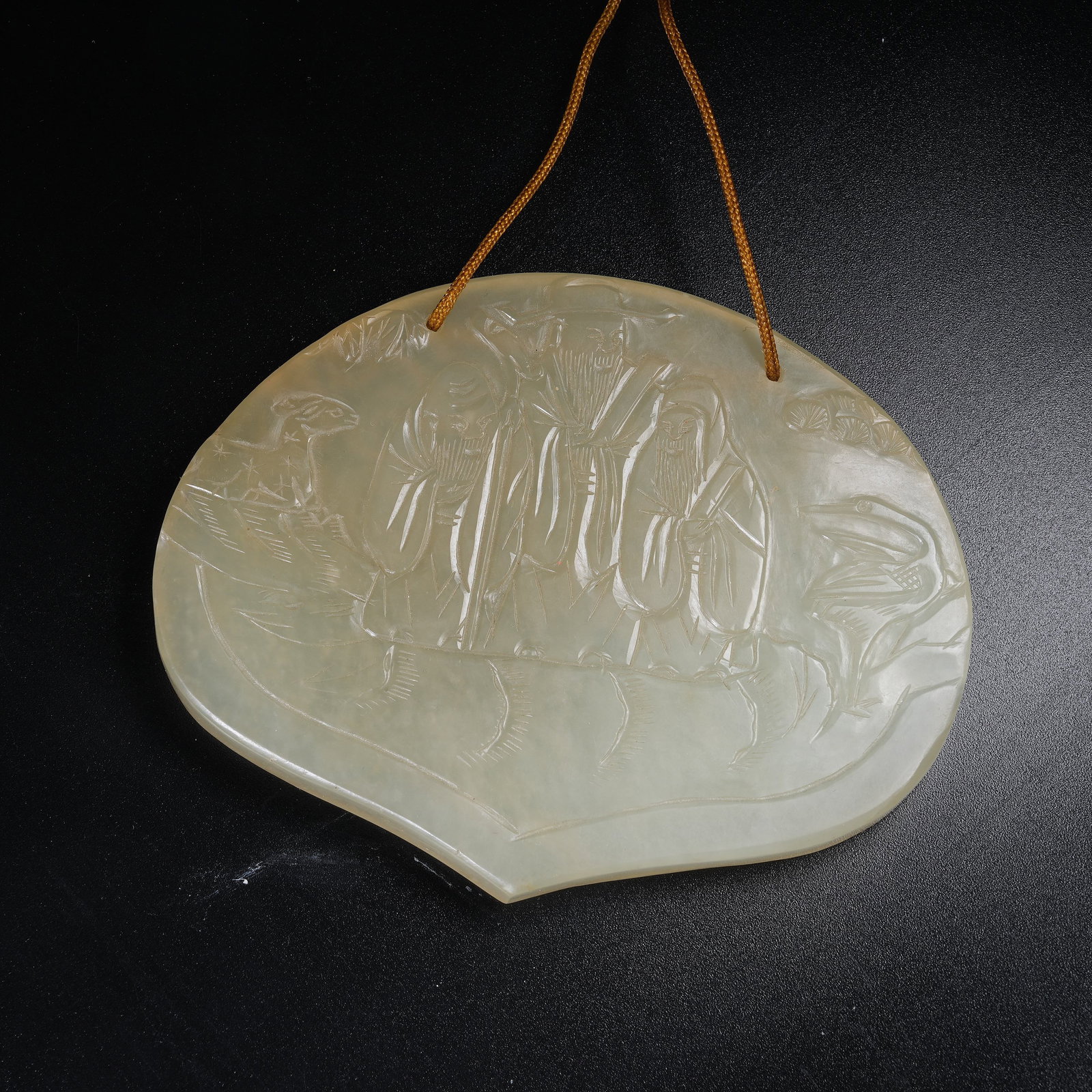 A HETIAN JADE PENDANT BLESSING FORTUNE, PROSPERITY AND LONGEVITY (1 of 10)