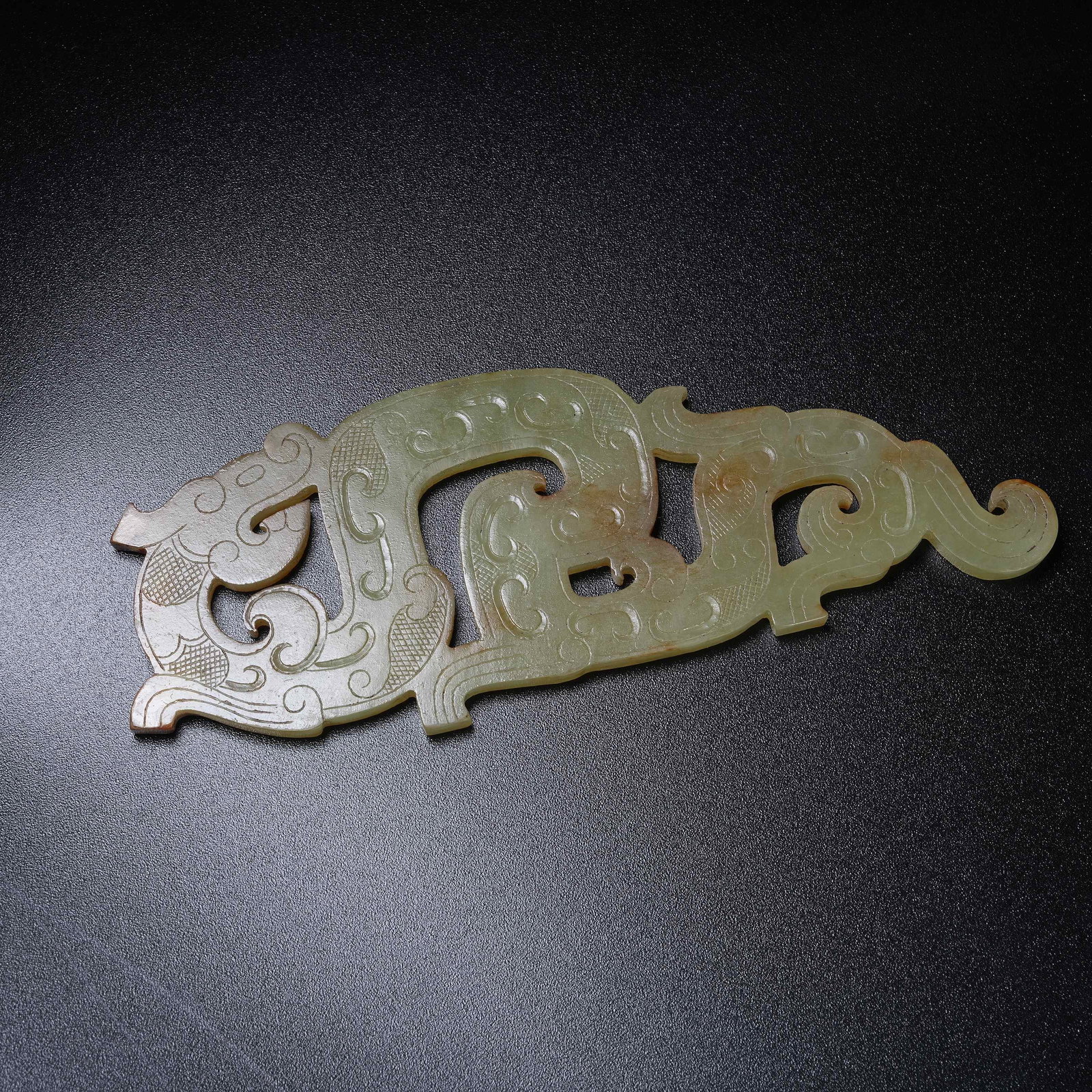 A ANCIENT JADE S-SHAPED DRAGON PENDANT: Ancient Jade S-shaped Dragon Pendant
