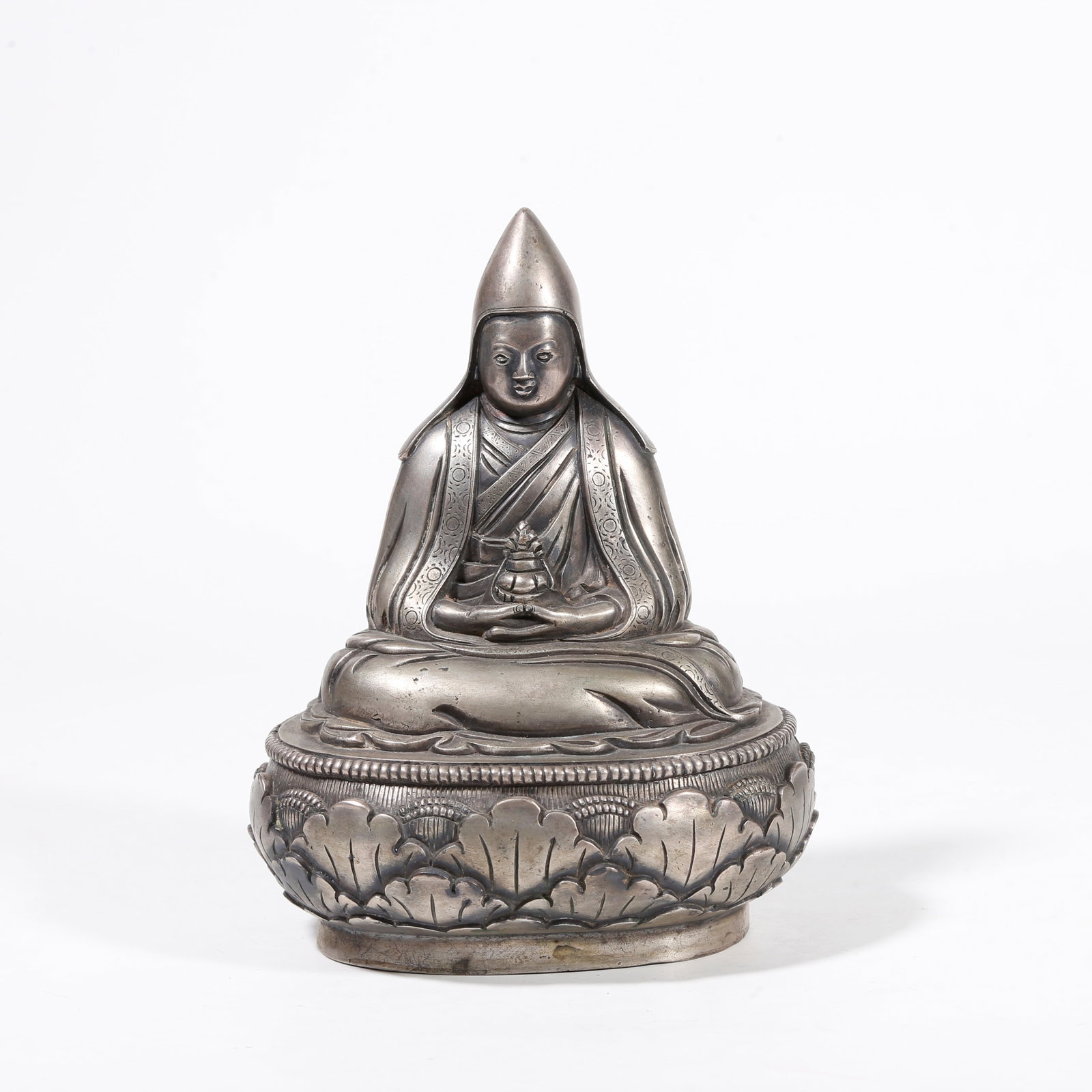 A SILVER STATUE OF LAMA GURU (1 of 9)