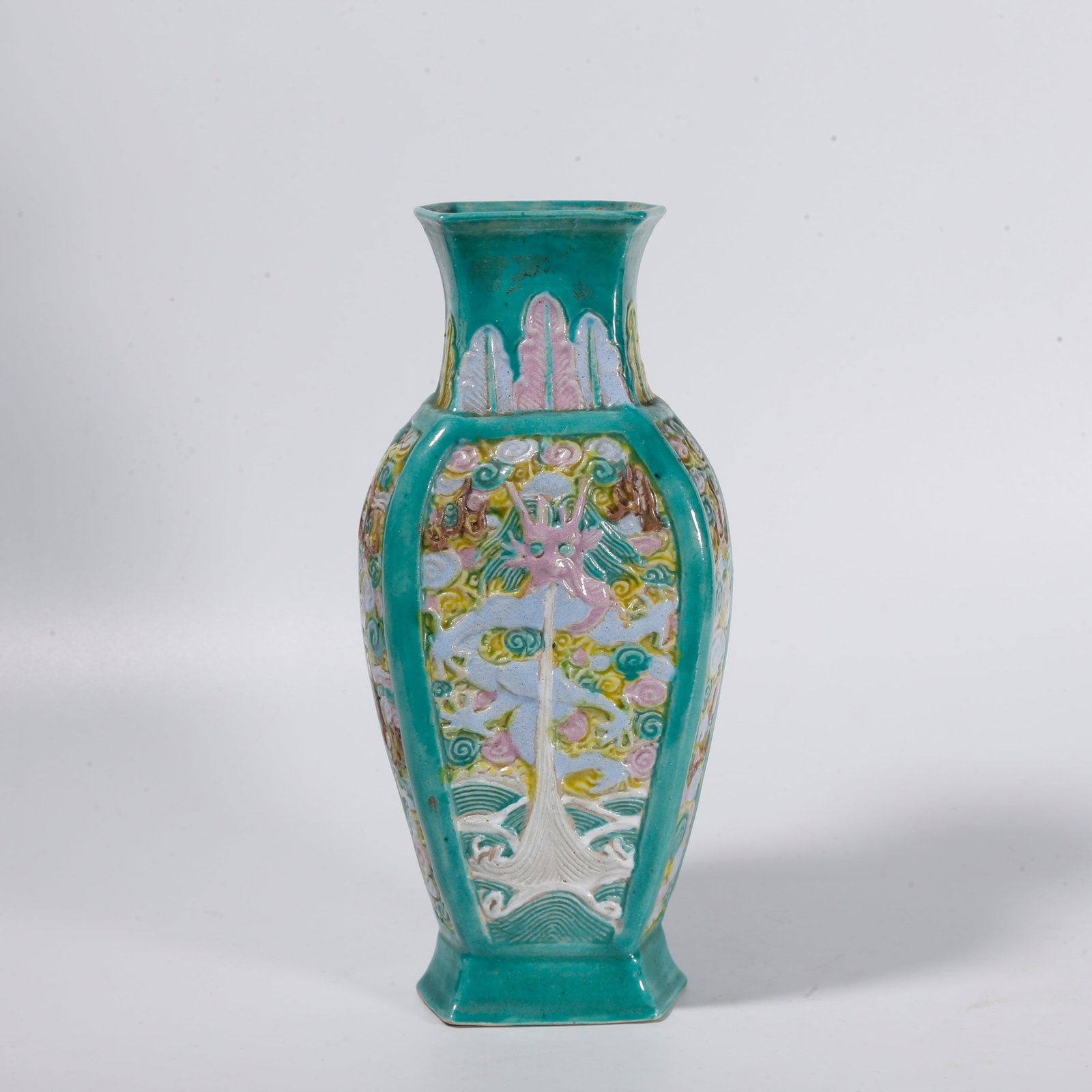 A GREEN GROUND FAMILLE ROSE VASE WITH SEA WAVE AND DRAGON PATTERNS: Green Ground Famille Rose Vase with Sea Wave and Dragon Patterns