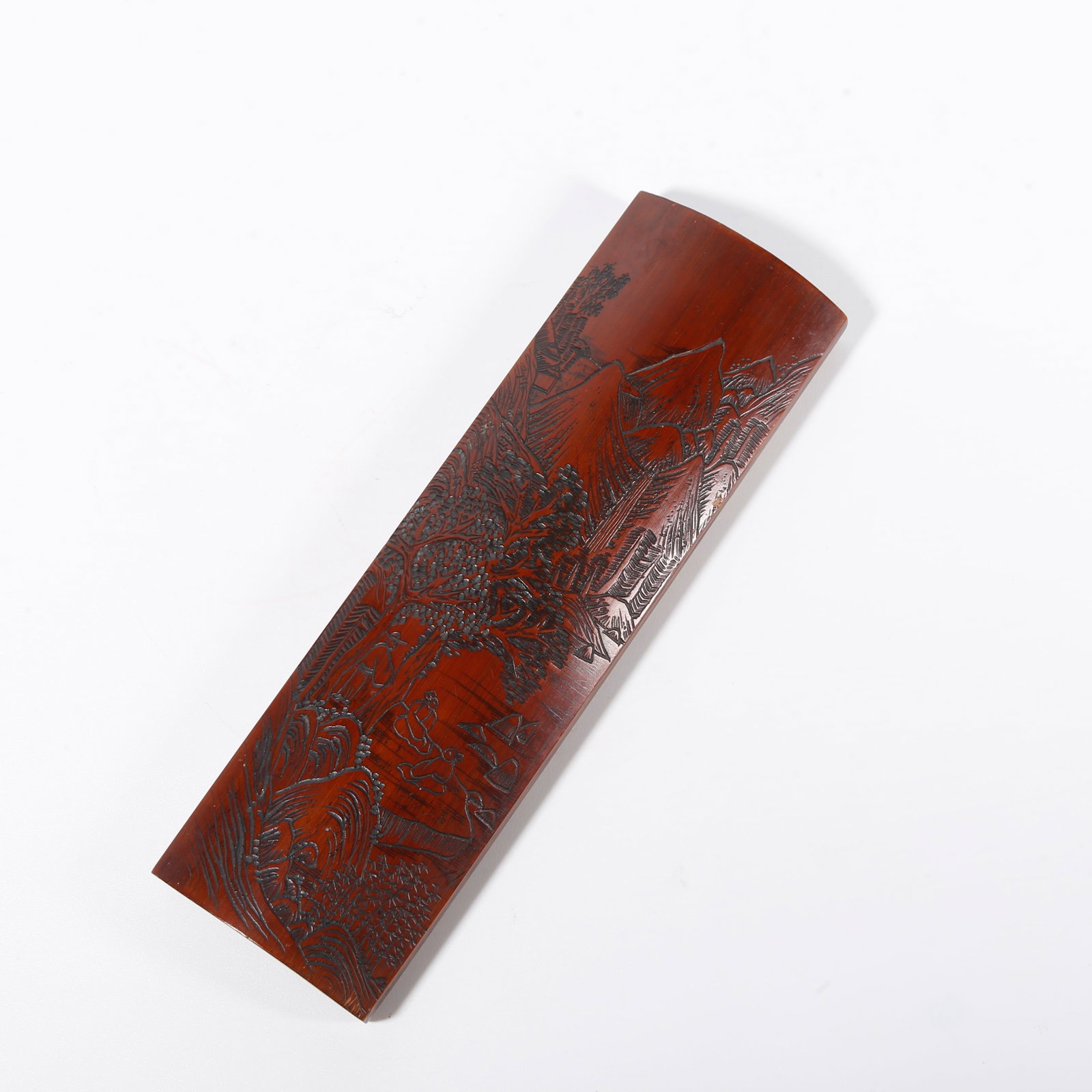 A BAMBOO WRIST REST CARVED WITH LANDSCAPE AND FIGURE PATTERNS: Bamboo Wrist Rest Carved with Landscape and Figure Patterns