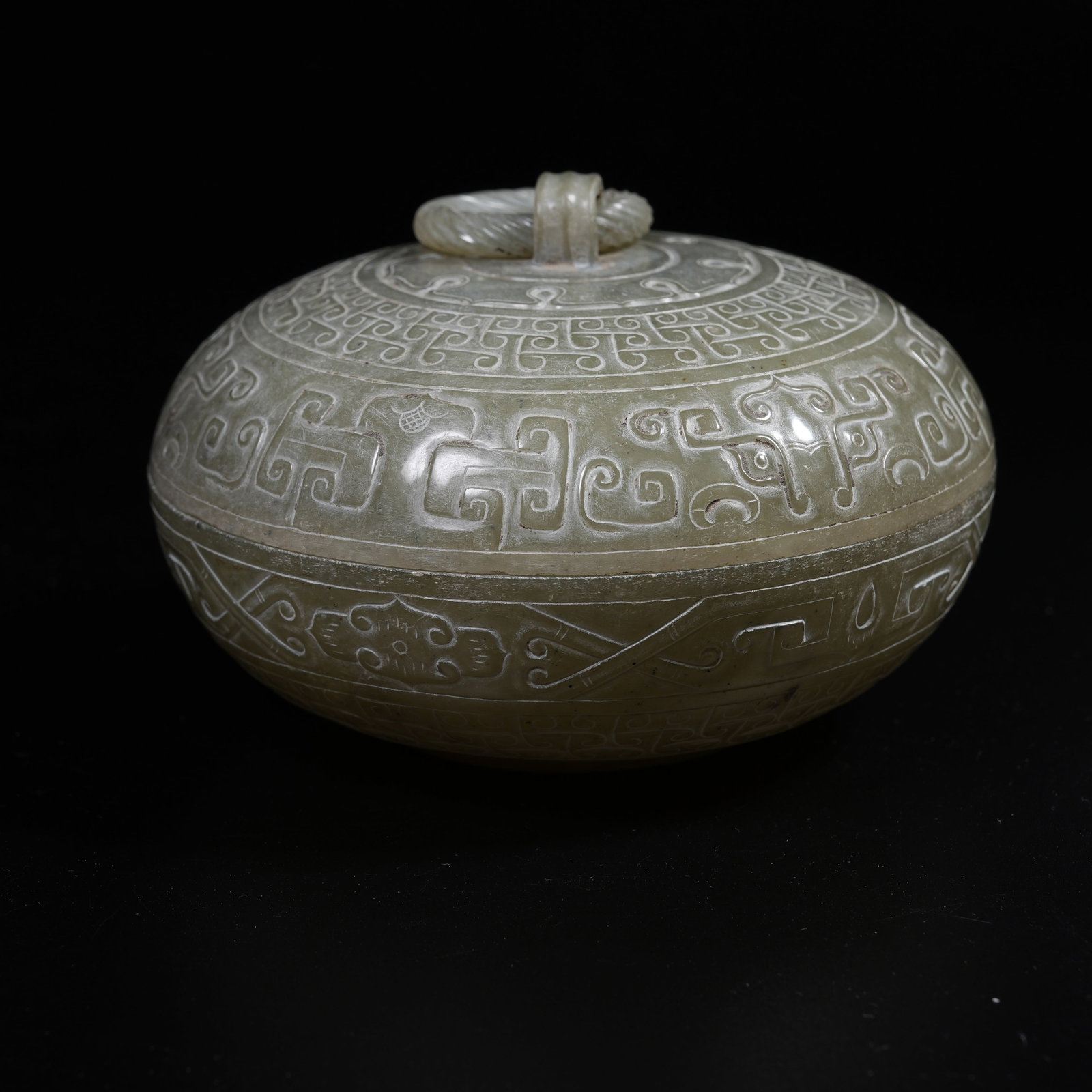 A ANCIENT JADE COVERED BOX WITH BEAST MASK PATTERNS (1 of 9)