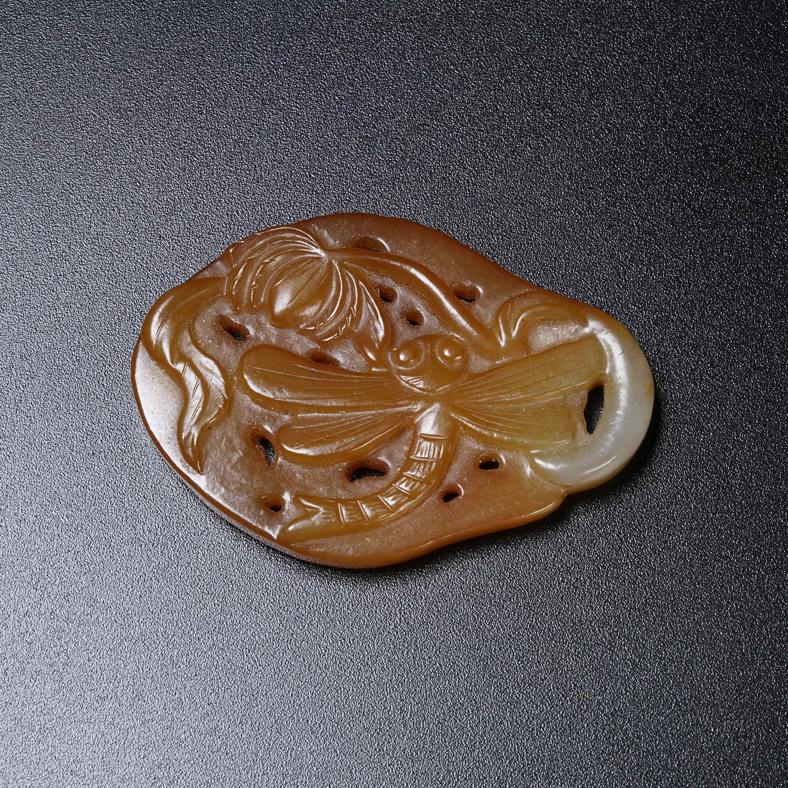 A HETIAN JADE PENDANT WITH FLOWERS AND INSECTS: Hetian Jade Pendant with Flowers and Insects