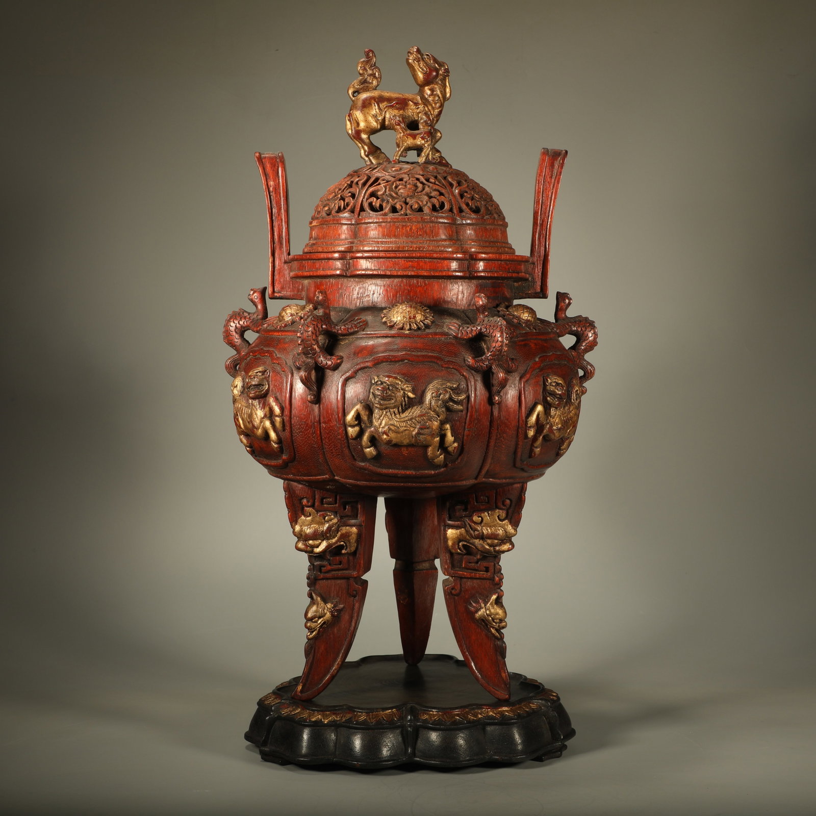 A GOLD-TRACED AGARWOOD INCENSE BURNER CARVED WITH ALL WISHES FULFILLED MOTIFS: Gold-Traced Agarwood Incense Burner Carved with All Wishes Fulfilled Motifs