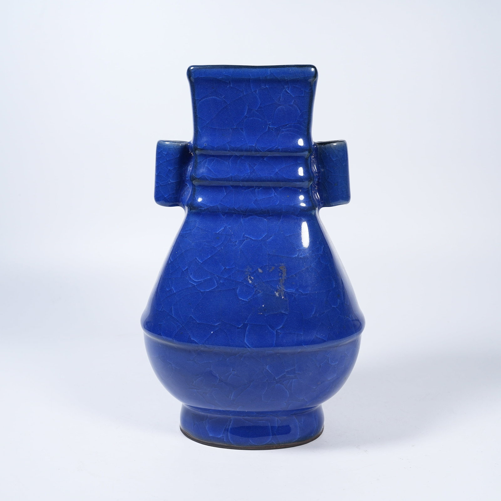 A SACRIFICIAL BLUE GLAZE PIERCED-EAR VASE: Sacrificial Blue Glaze Pierced-Ear Vase