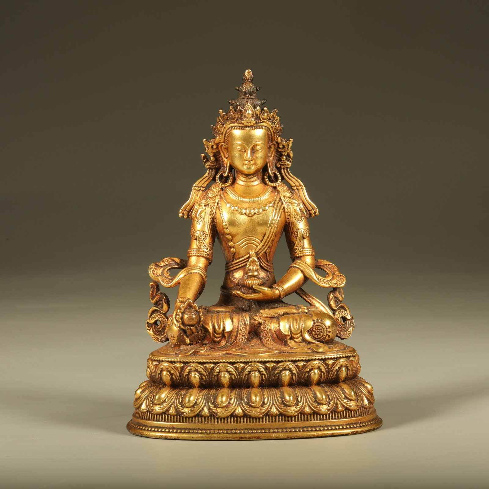 A GILT BRONZE STATUE OF KSITIGARBHA BODHISATTVA: Gilt Bronze Statue of Ksitigarbha Bodhisattva