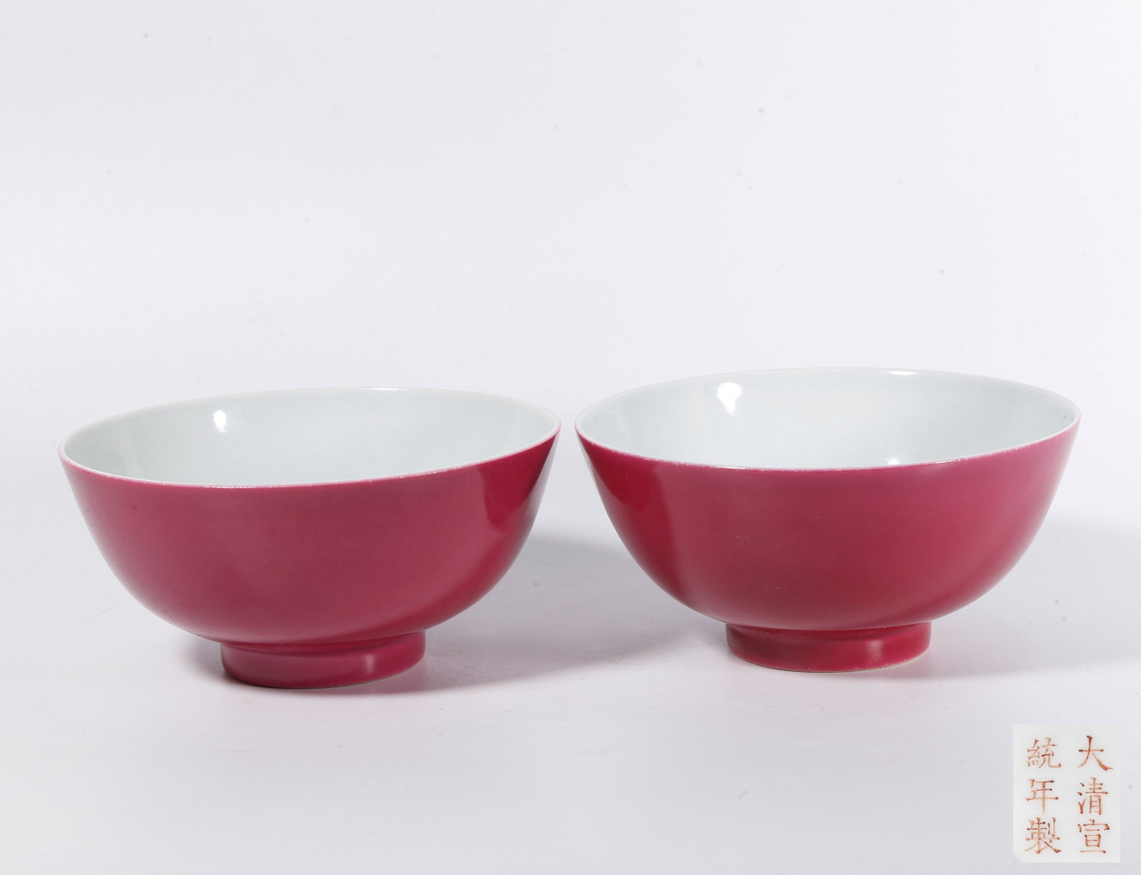 A PAIR OF CARMINE GLAZE BOWLS (1 of 8)