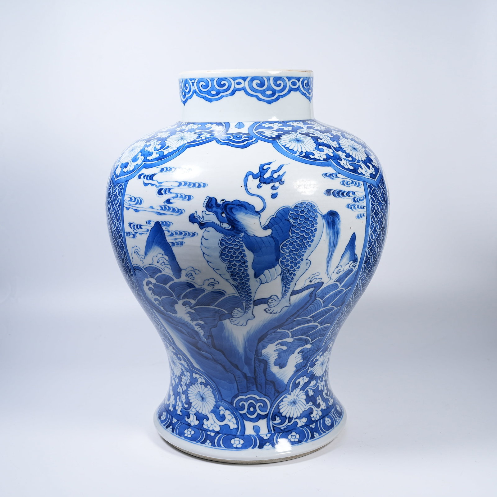 A BLUE AND WHITE JAR WITH AUSPICIOUS BEAST PATTERNS: Blue and White Jar with Auspicious Beast Patterns