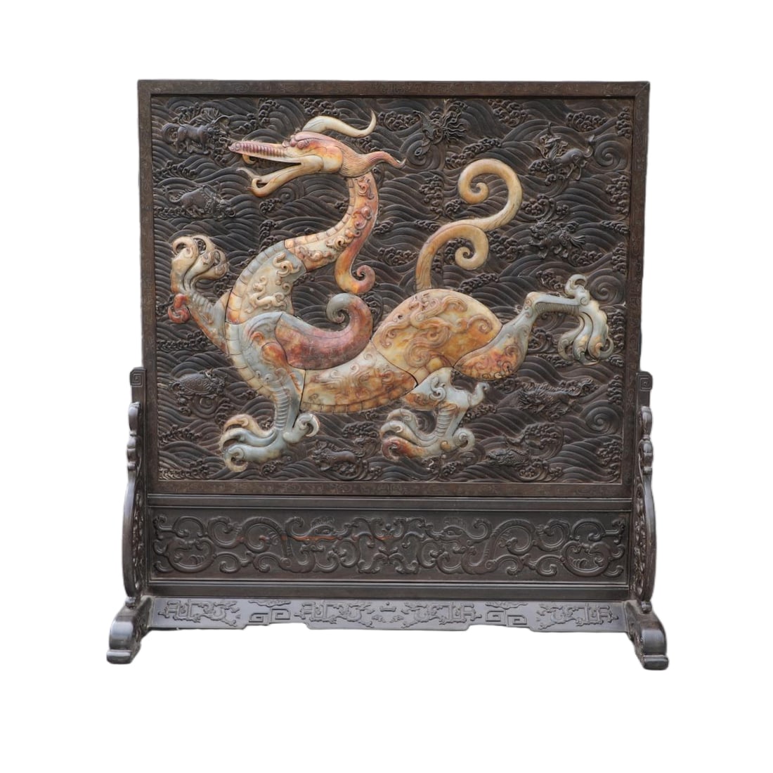A RED SANDALWOOD STANDING SCREEN CARVED WITH SEA WAVES AND CALLIGRAPHY INLAID WITH JADE DRAGON: Red Sandalwood Standing Screen Carved with Sea Waves and Calligraphy Inlaid with Jade Dragon Ornaments