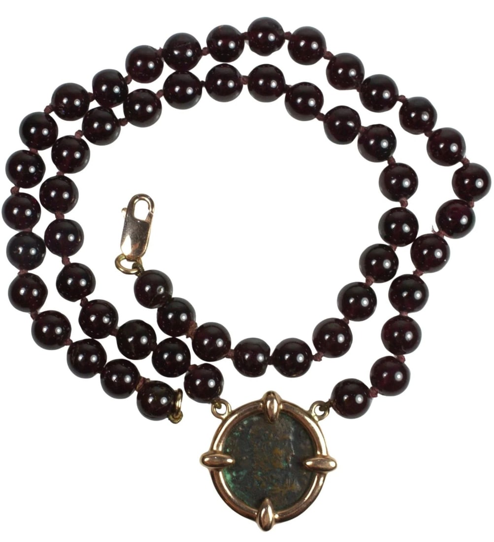 BESPOKE GARNET NECKLACE SUPPORTING A ROMAN AE BRONZE COIN IN 9CT YELLOW GOLD SURROUND: Bespoke Garnet Necklace supporting a Roman Ae Bronze Coin in 9ct Yellow Gold Surround