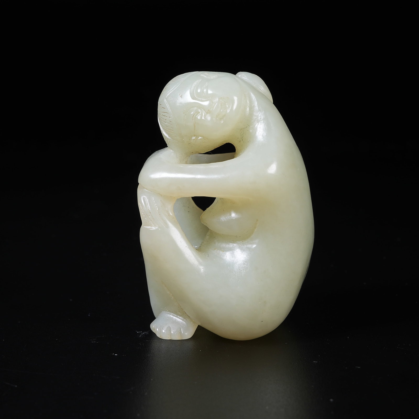A HETIAN JADE HUMAN FIGURE PENDANT: Hetian Jade Human Figure Pendant