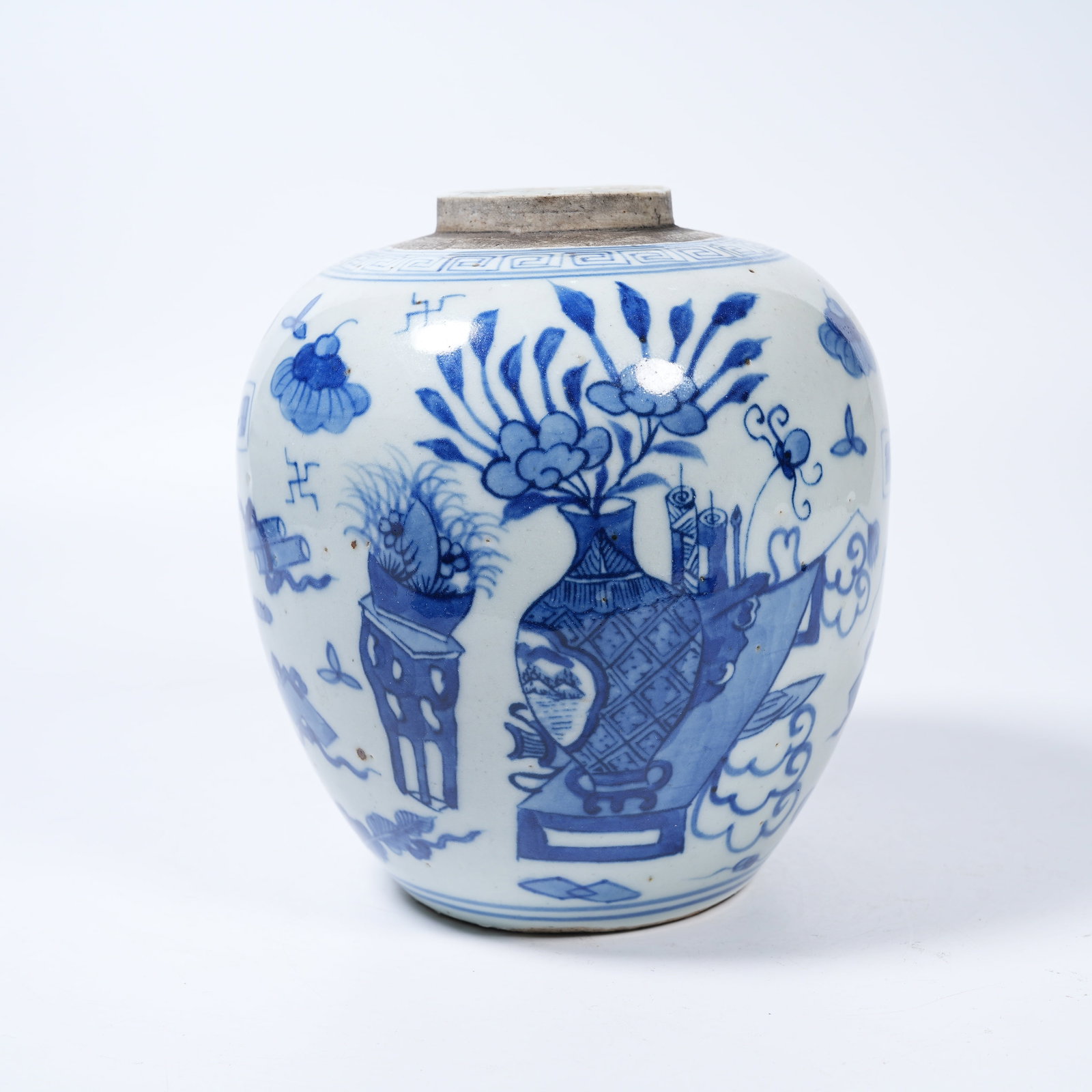 A BLUE AND WHITE JAR WITH ANTIQUE ORNAMENT PATTERNS: Blue and White Jar with Antique Ornament Patterns