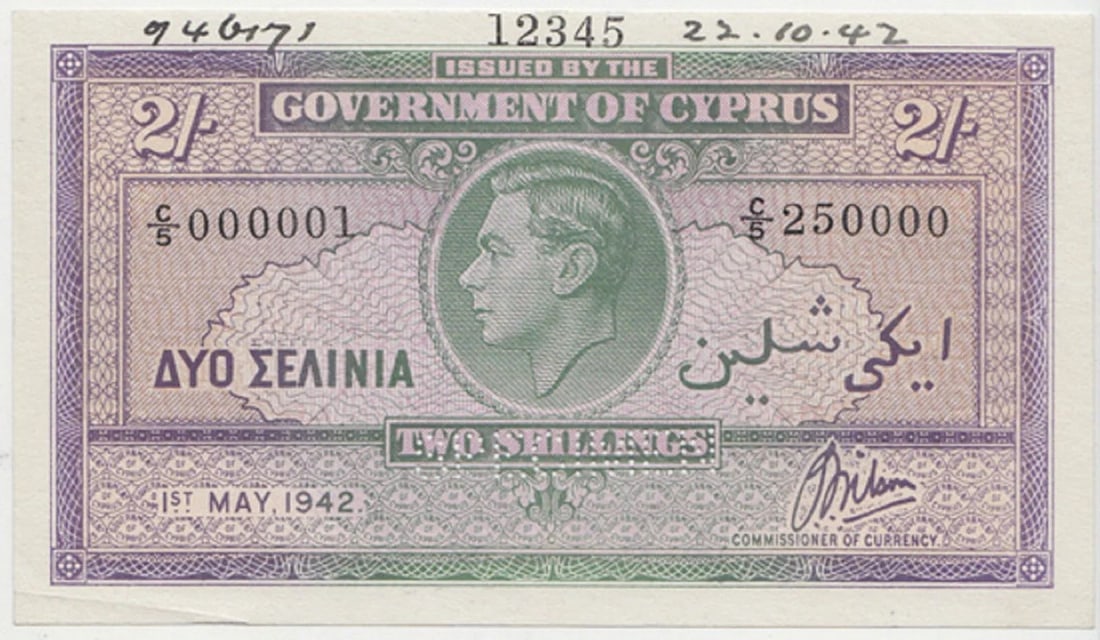CYPRUS '1ST MAY, 1942' 'SPECIMEN' 2/-, VIRTUALLY UNCIRCULATED OPQ: Like Pick# 21 : Serial# C5 000001ConditionO(riginal) P(aper) Q(uality), small corner creaseMediumCoins, Monies & StampsProvenancePerforated "SPECIMEN". Numbered on edge "12345" Pen notation to top