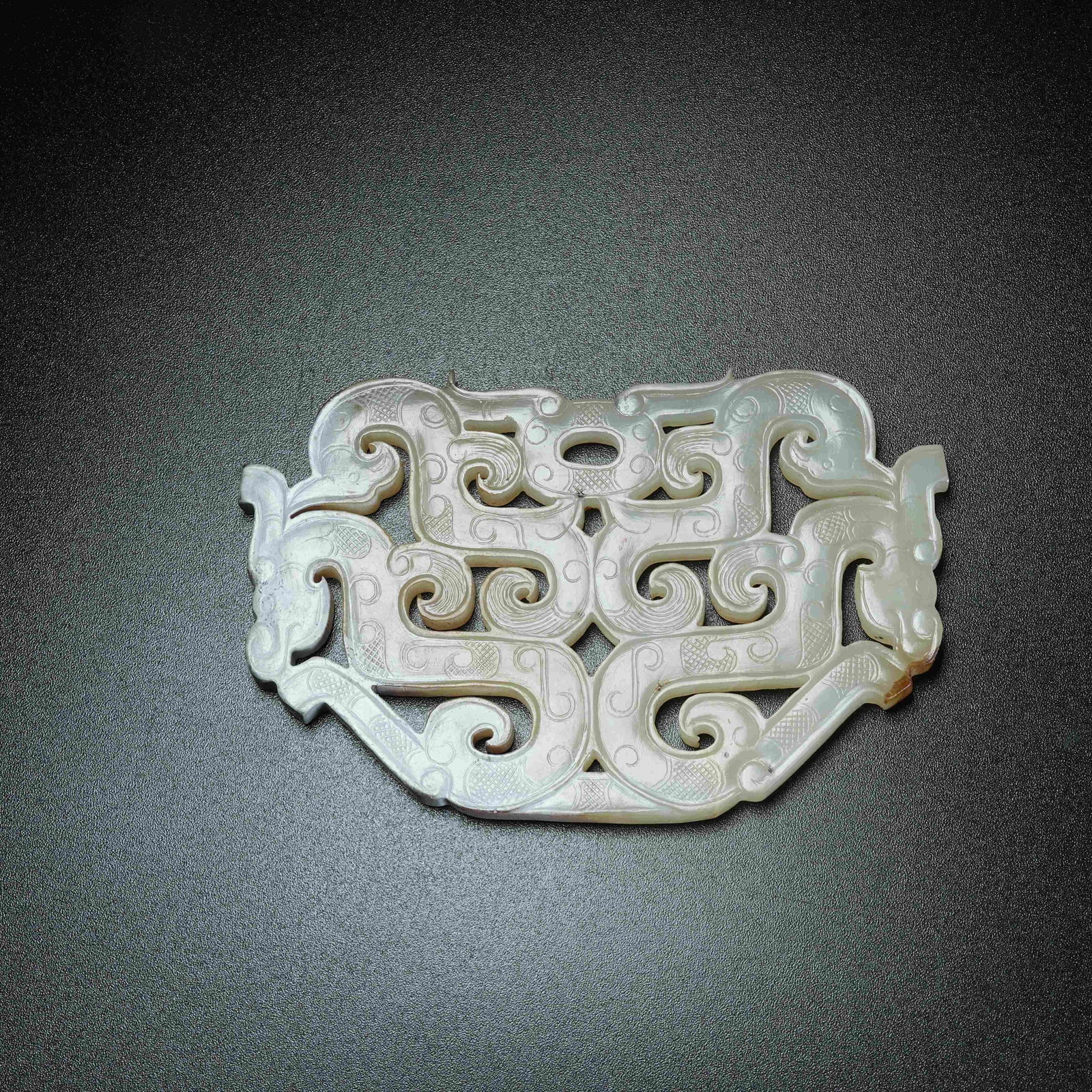 A ARCHAIC JADE PENDANT WITH DRAGON PATTERN: Archaic Jade Pendant with Dragon Pattern