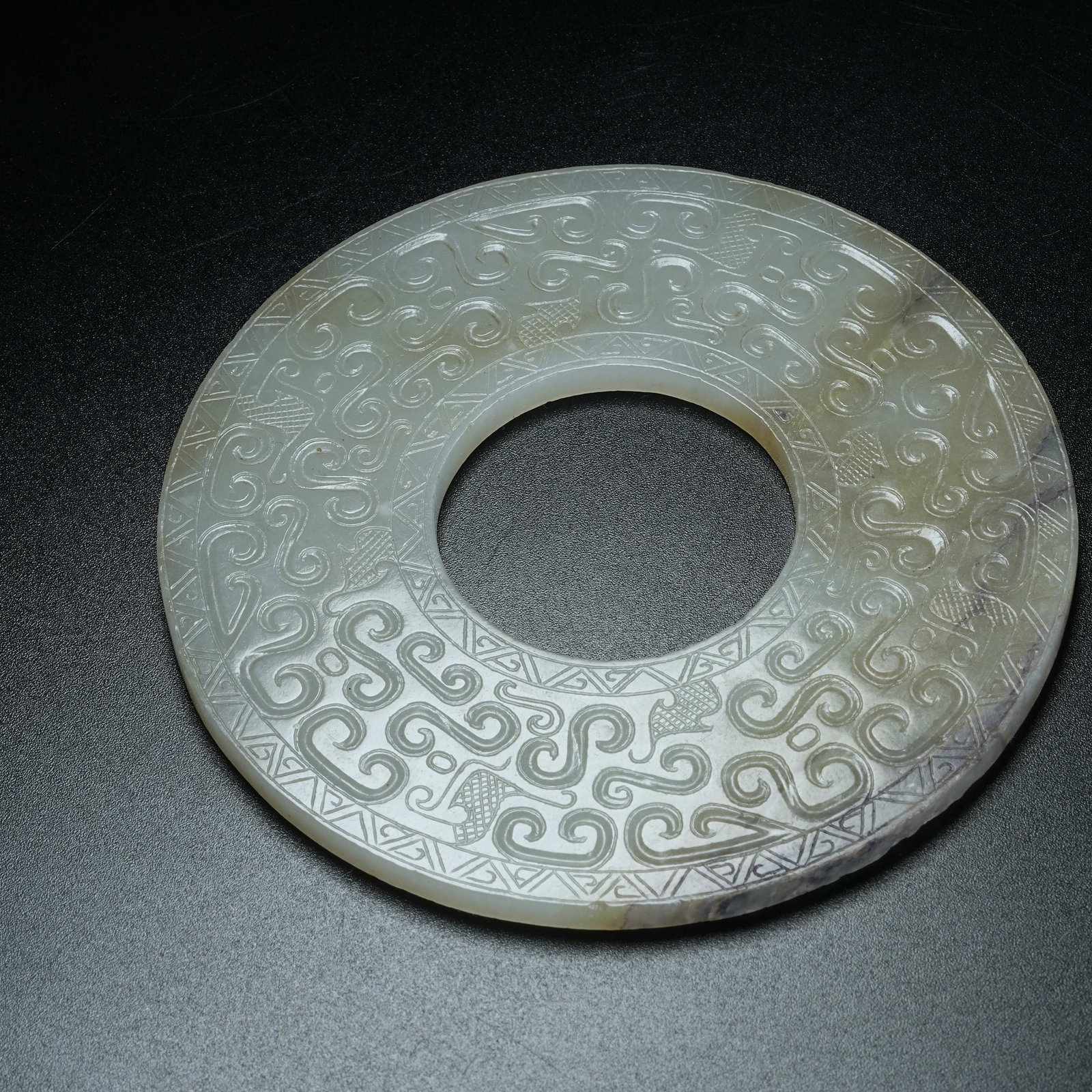 A ARCHAIC JADE BI DISC WITH HOOKED CLOUD PATTERN - 7