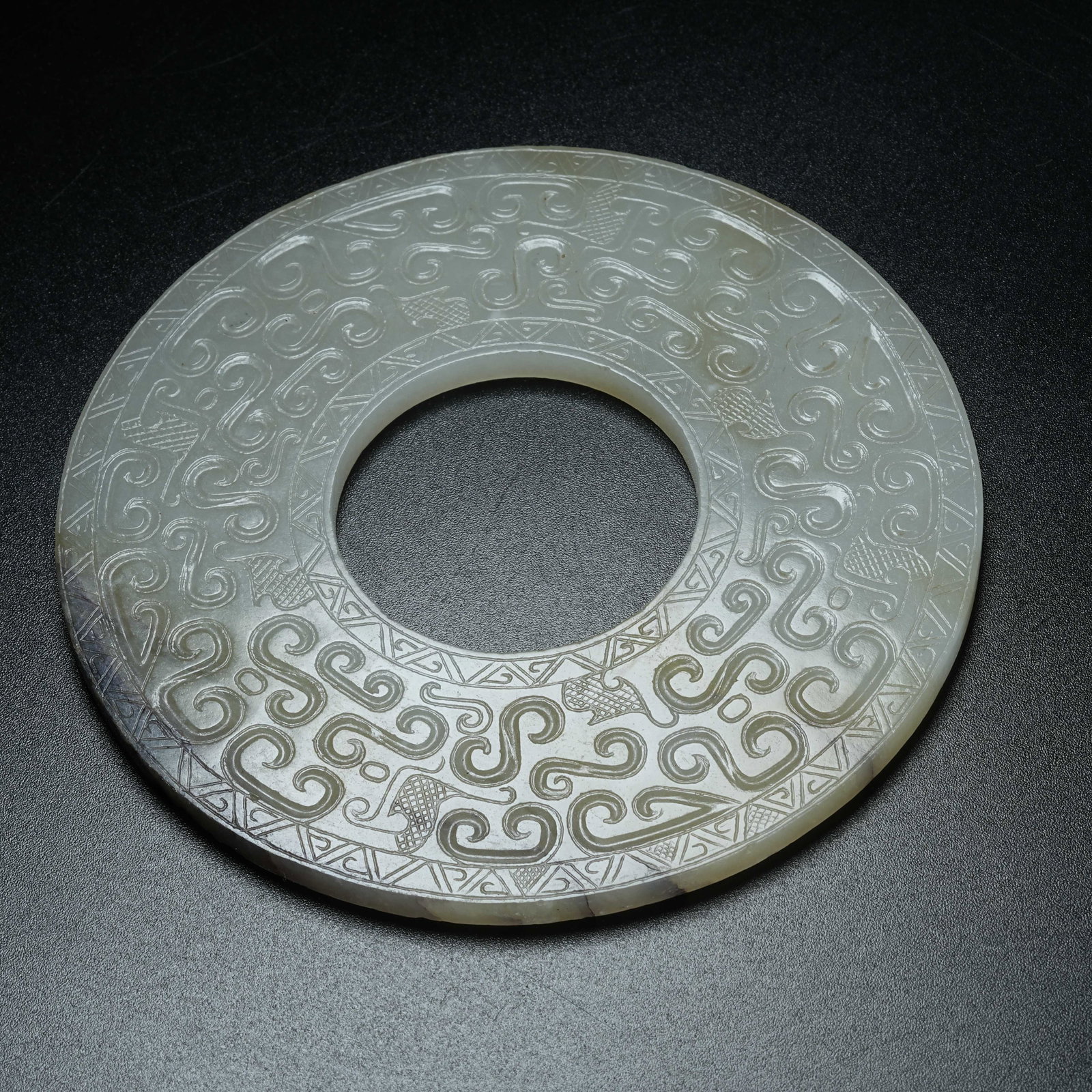 A ARCHAIC JADE BI DISC WITH HOOKED CLOUD PATTERN - 8