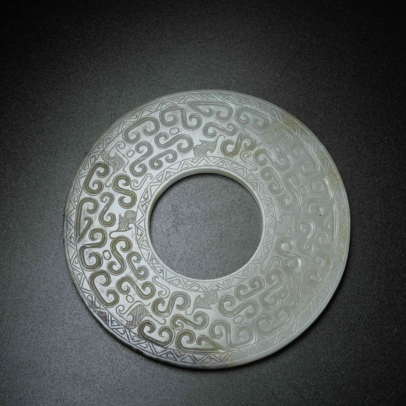 A ARCHAIC JADE BI DISC WITH HOOKED CLOUD PATTERN - 9
