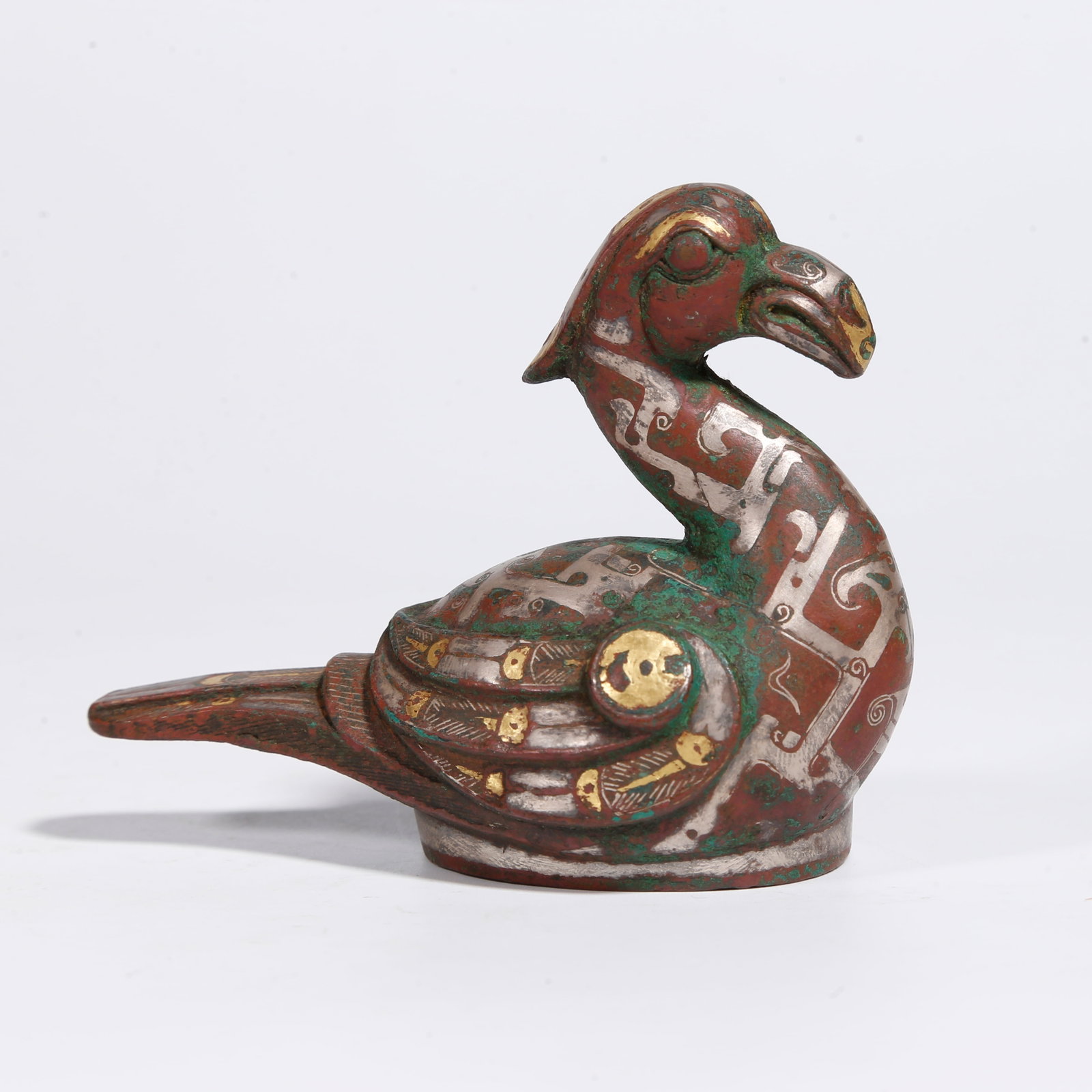 A BRONZE GOOSE-SHAPED ORNAMENT INLAID WITH GOLD AND SILVER: Bronze Goose-Shaped Ornament Inlaid with Gold and Silver