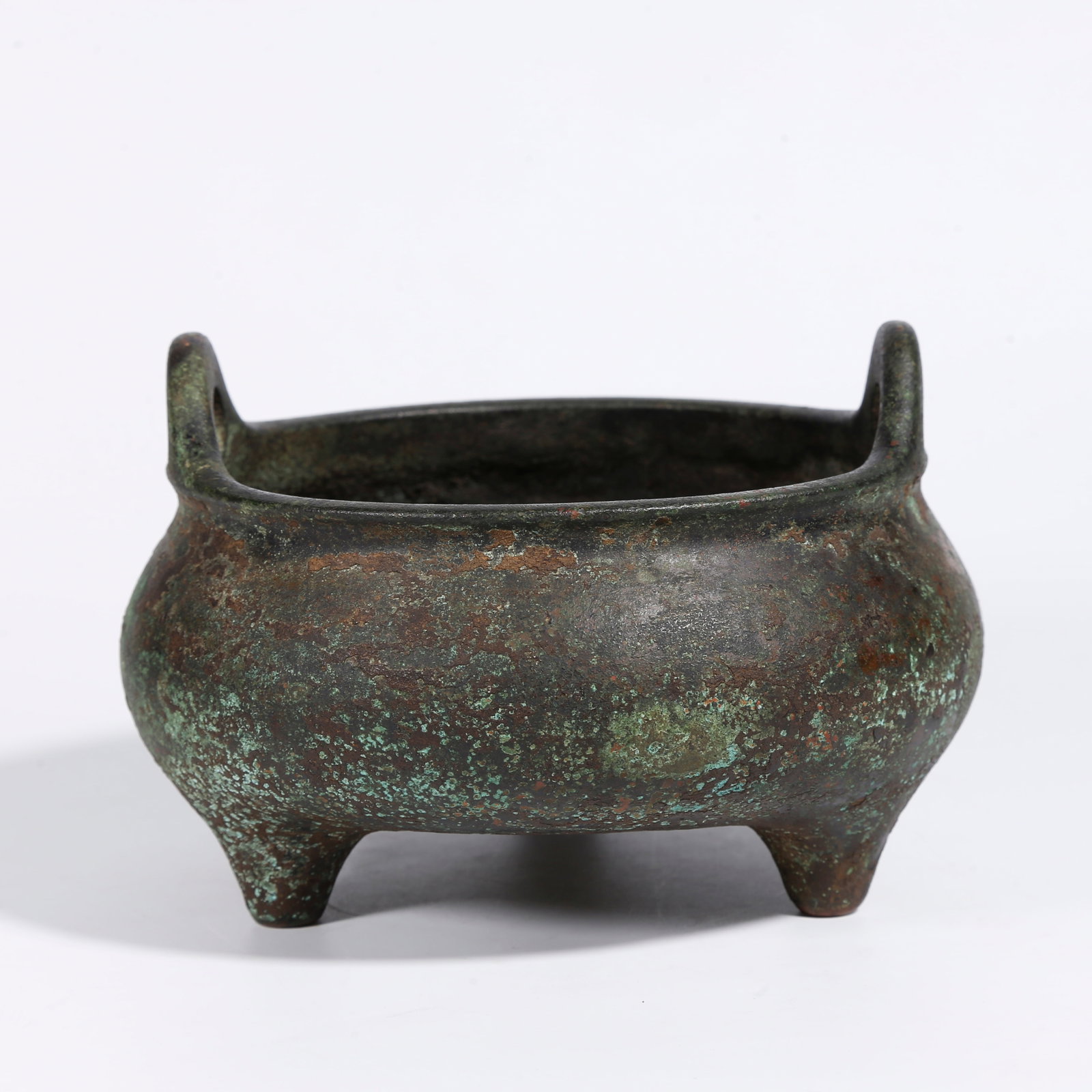 A BRONZE TRIPOD CENSER WITH UPRIGHT EARS (1 of 9)
