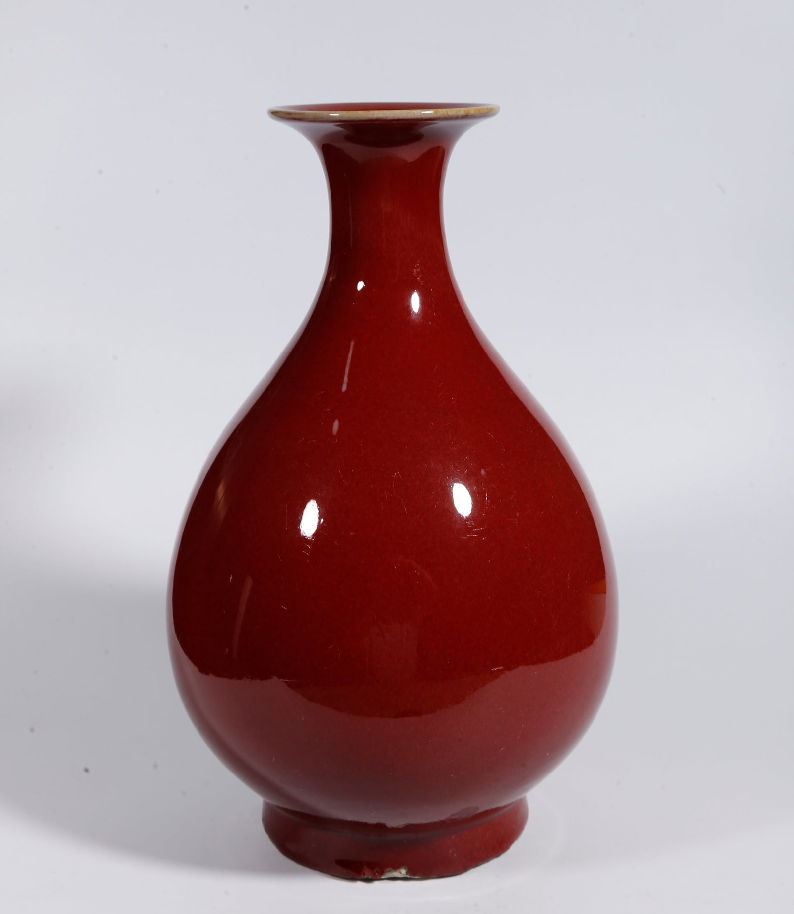 A RED GLAZE PEAR-SHAPED VASE: Red Glaze Pear-shaped Vase