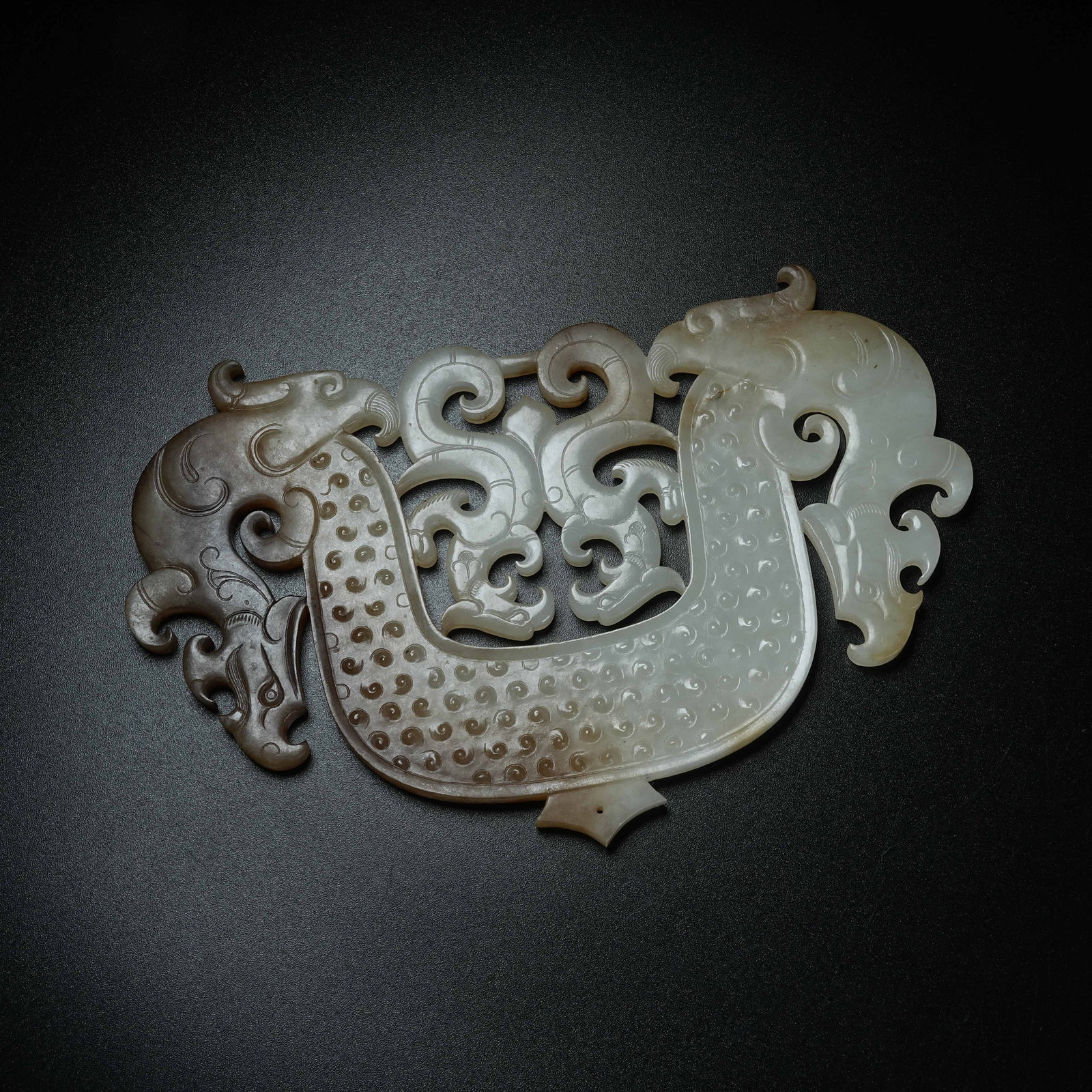A ARCHAIC JADE S-SHAPED DRAGON PENDANT (1 of 8)
