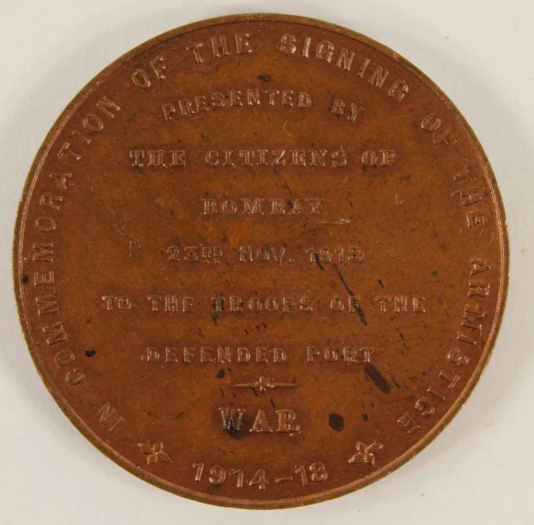 WWI - INDIA (BRITISH) 1918 BOMBAY 'ARMISTICE' BRONZE MEDAL, CHOICE UNCIRCULATED WITH SOME LUSTRE: 'Presented by the Citizens of Bombay 23rd Nov 1918 to the Troops of the Defended Port / Commemoration of the Signing of the Armistice'SizeDiameter 40mmMediumMilitary & Wartime