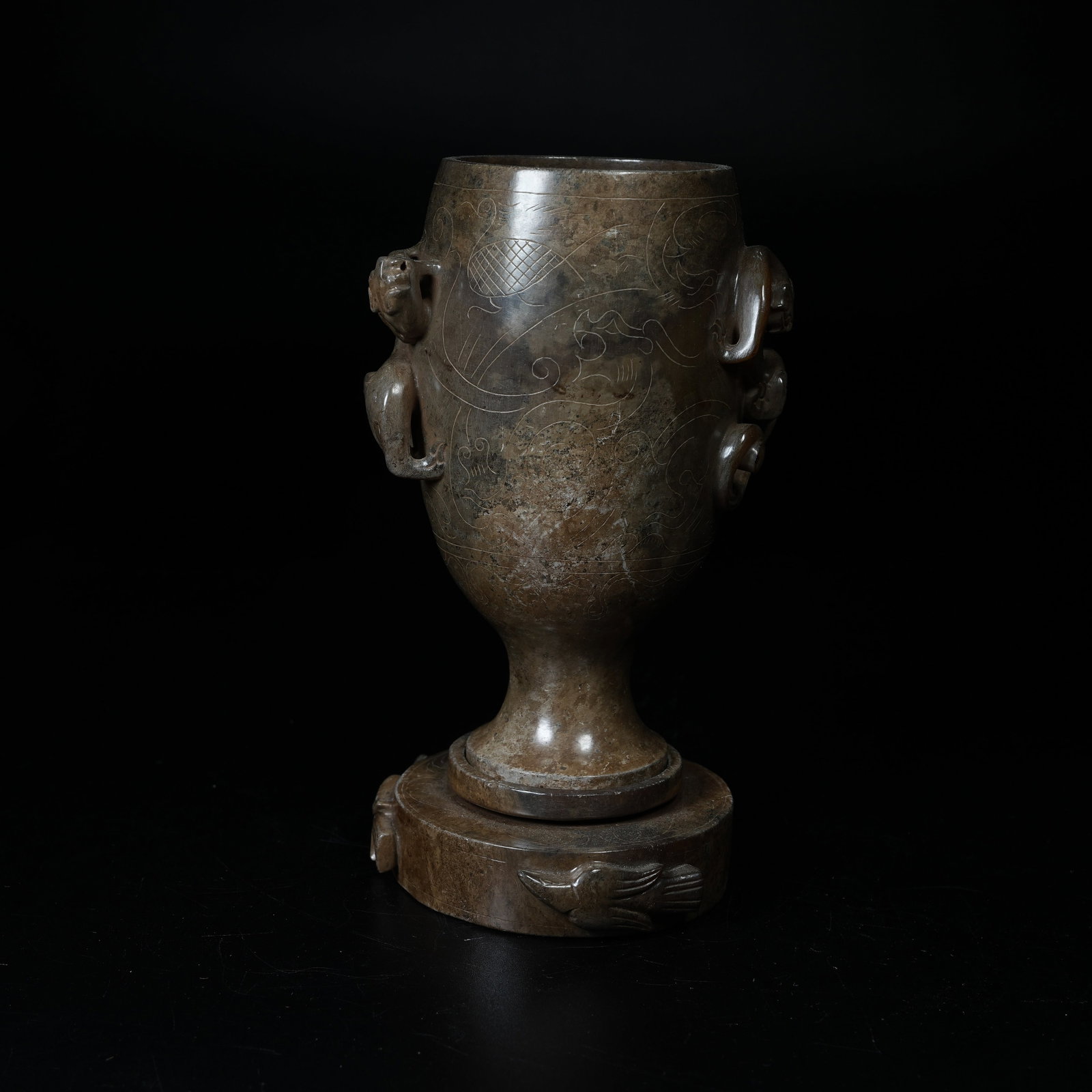 A ARCHAIC JADE STEM CUP CARVED WITH CHILONG PATTERNS: Archaic Jade Stem Cup Carved with Chilong Patterns