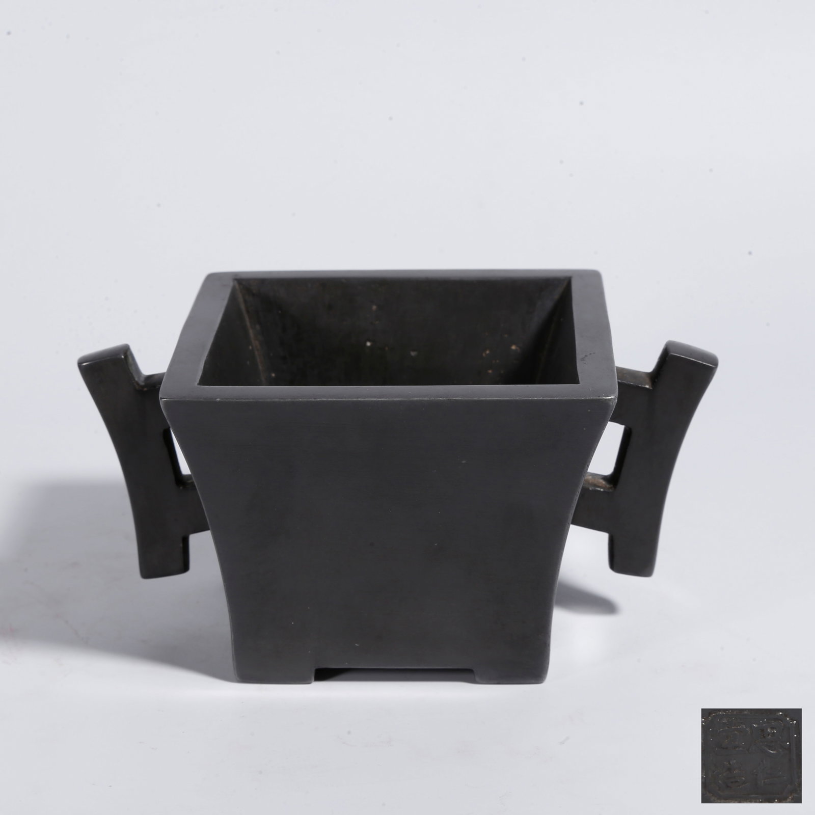 A TIN CENSER WITH DOUBLE HALBERD HANDLES: Tin Censer with Double Halberd Handles