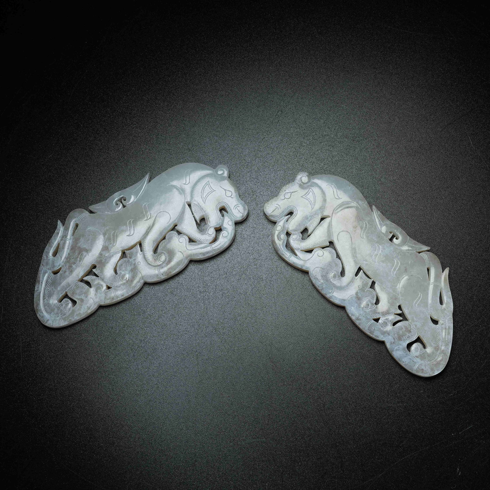 A SET OF ARCHAIC JADE ASSEMBLED PENDANTS WITH BEAST PATTERN: Set of Archaic Jade Assembled Pendants with Beast Pattern