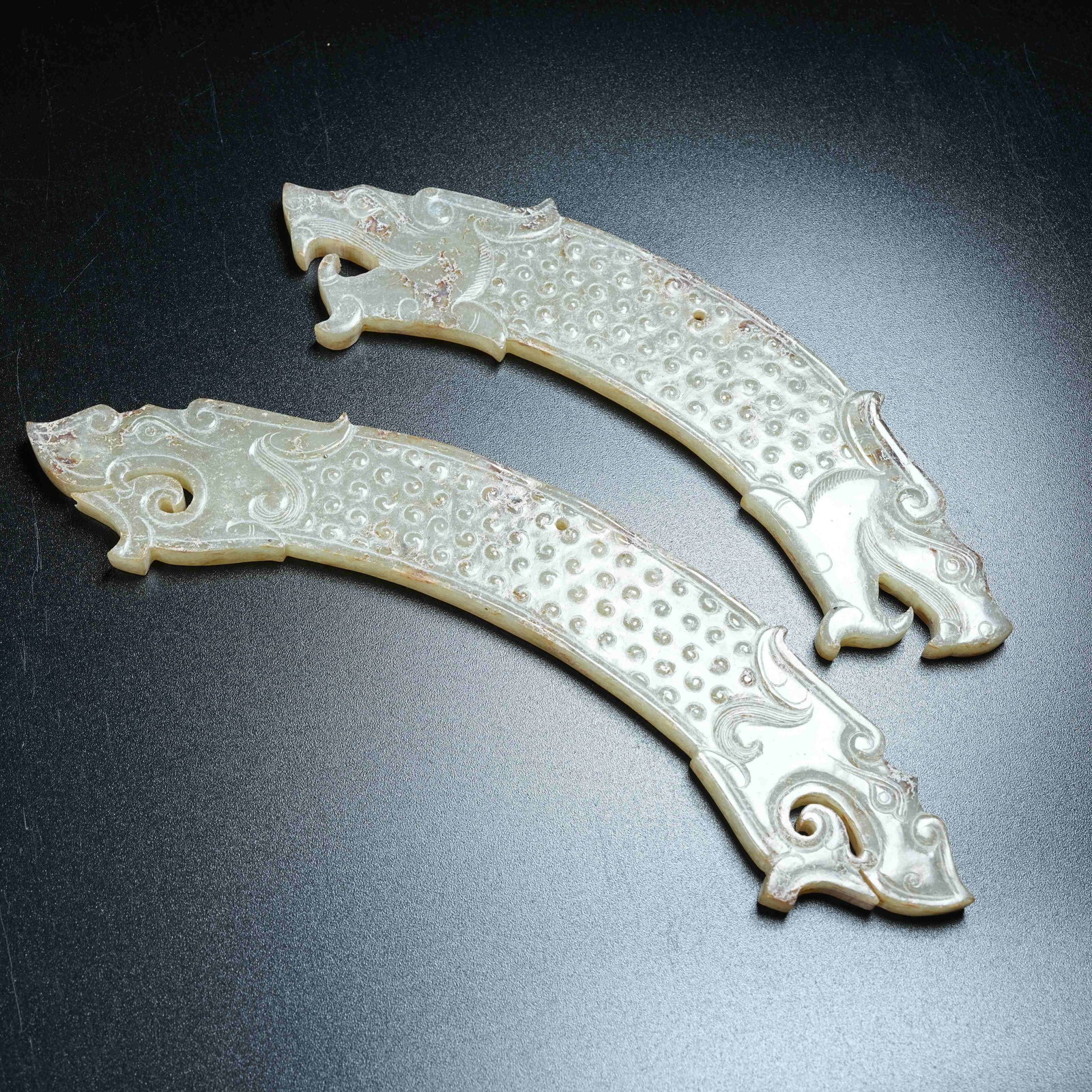A SET OF ANCIENT JADE BEAST-SHAPED HUANG ARCS (1 of 8)