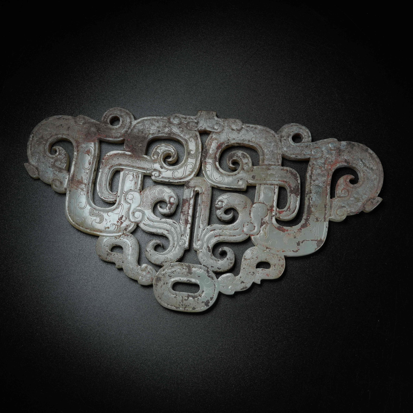 A ARCHAIC JADE ASSEMBLED PENDANT SET WITH DRAGON PATTERN: Archaic Jade Assembled Pendant Set with Dragon Pattern