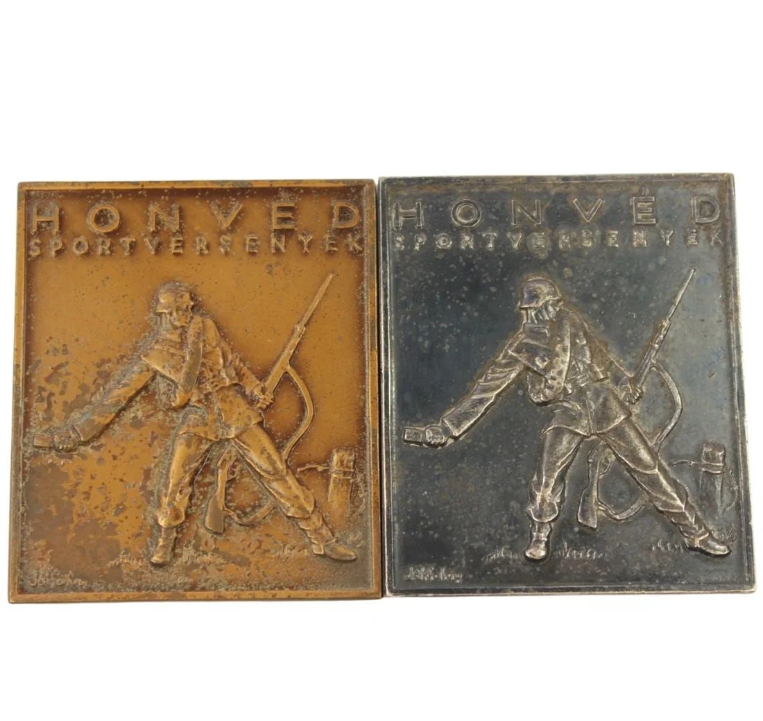HUNGARY 1950 & 1951 DEFENDERS OF THE HOMELAND SPORTS COMPETITIONS MEDALS IN IRON & BRONZE (2 ITEMS): Hungary 1950 & 1951 Defenders of the Homeland Sports Competitions Medals in Iron & Bronze (2 items)