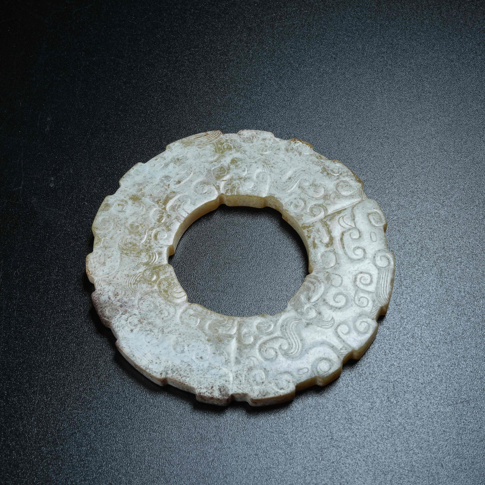 A ANCIENT JADE BI DISC WITH HOOKED CLOUD PATTERNS - 11