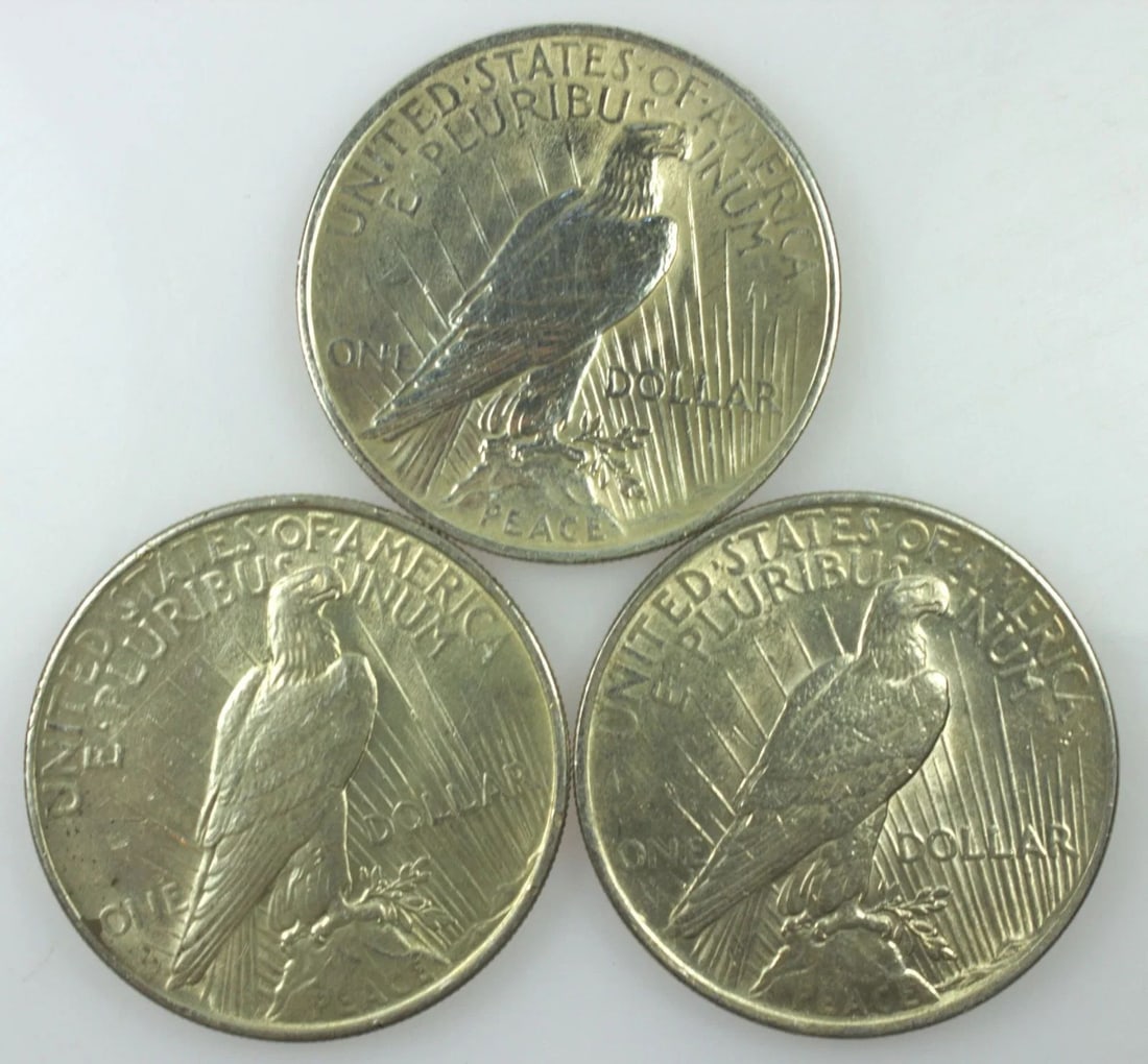 U.S.A. 1922 (NO MM) PEACE SILVER (900) DOLLARS, ABOUT UNCIRCULATED (3 COINS): U.S.A. 1922 (no MM) Peace Silver (900) Dollars, about Uncirculated (3 coins)