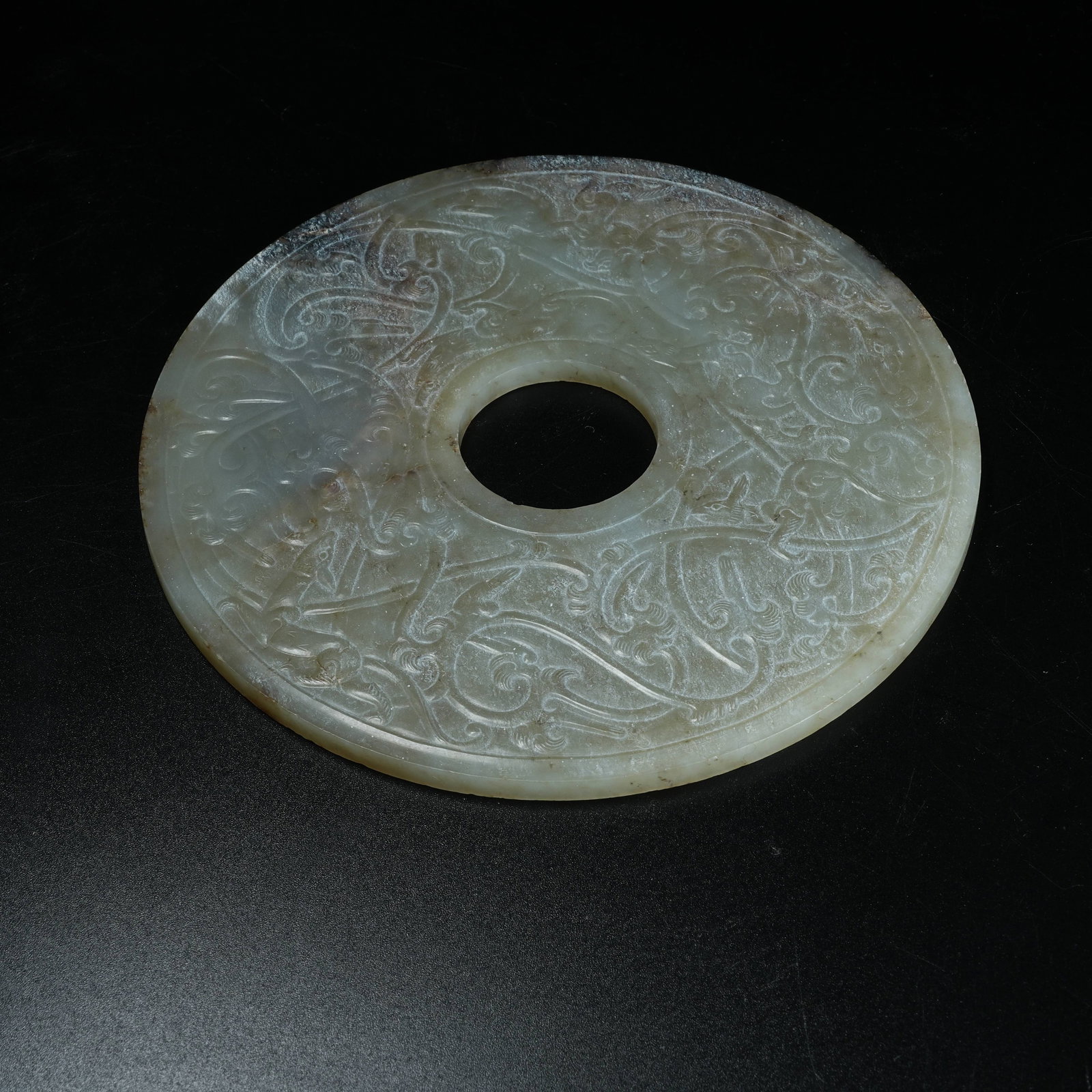 A ARCHAIC JADE BI DISC WITH BEAST PATTERN - 7