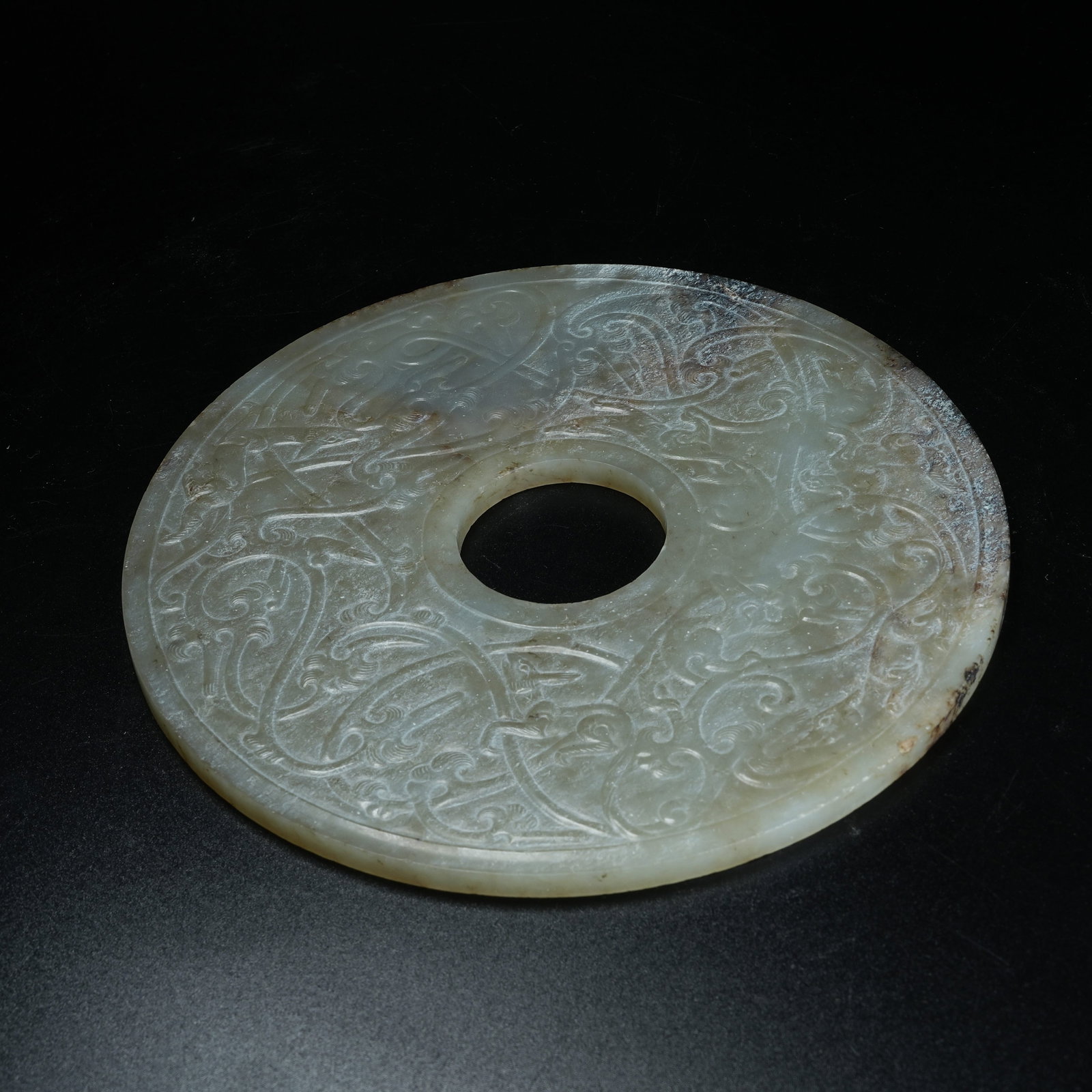 A ARCHAIC JADE BI DISC WITH BEAST PATTERN - 8