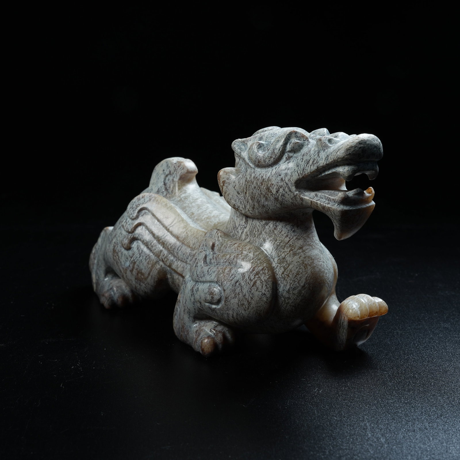 A ANCIENT JADE AUSPICIOUS BEAST ORNAMENT: Ancient Jade Auspicious Beast Ornament