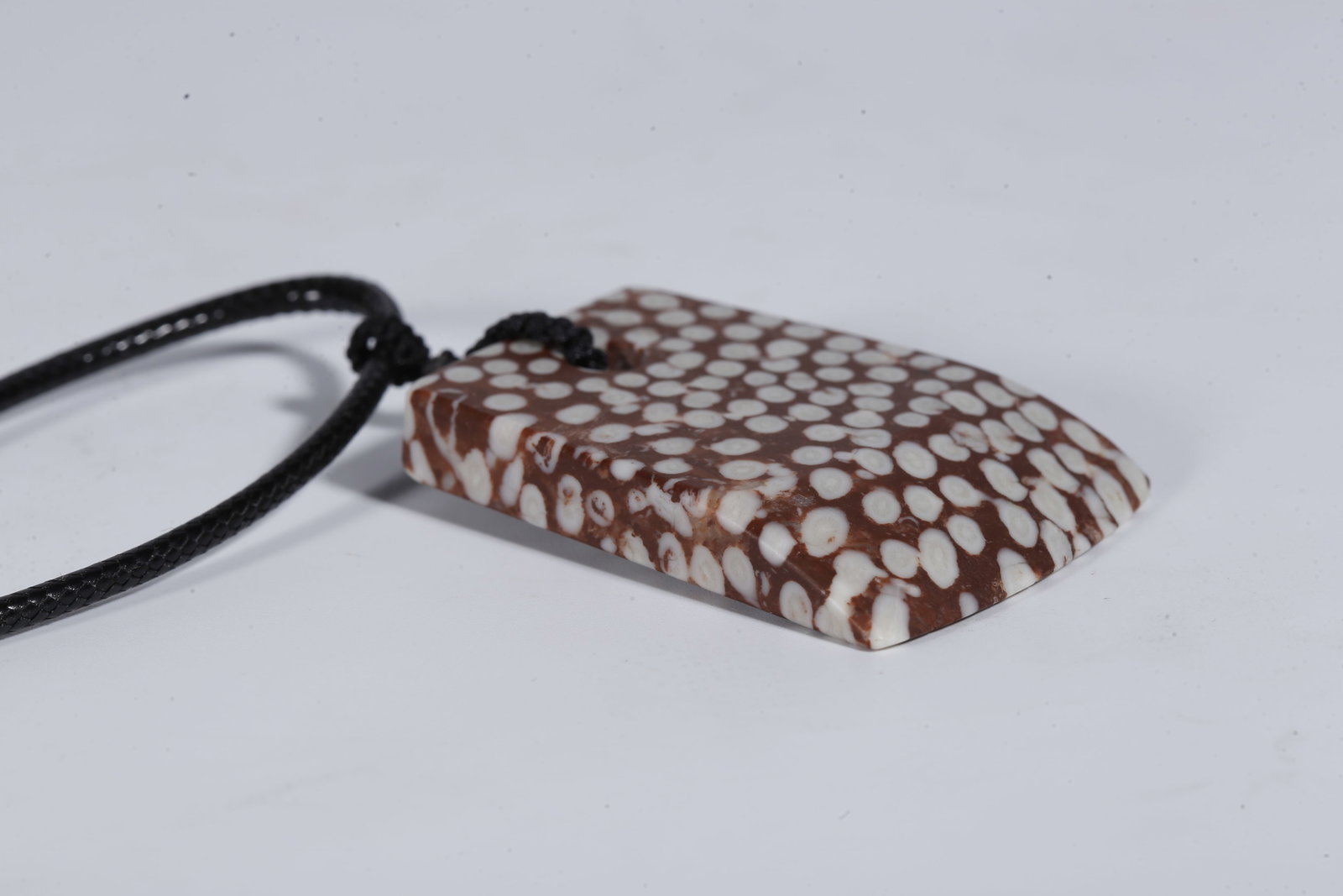A STONE PENDANT - 4