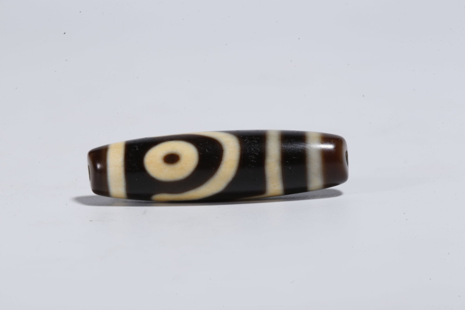 A TWO-EYED DZI BEAD - 3