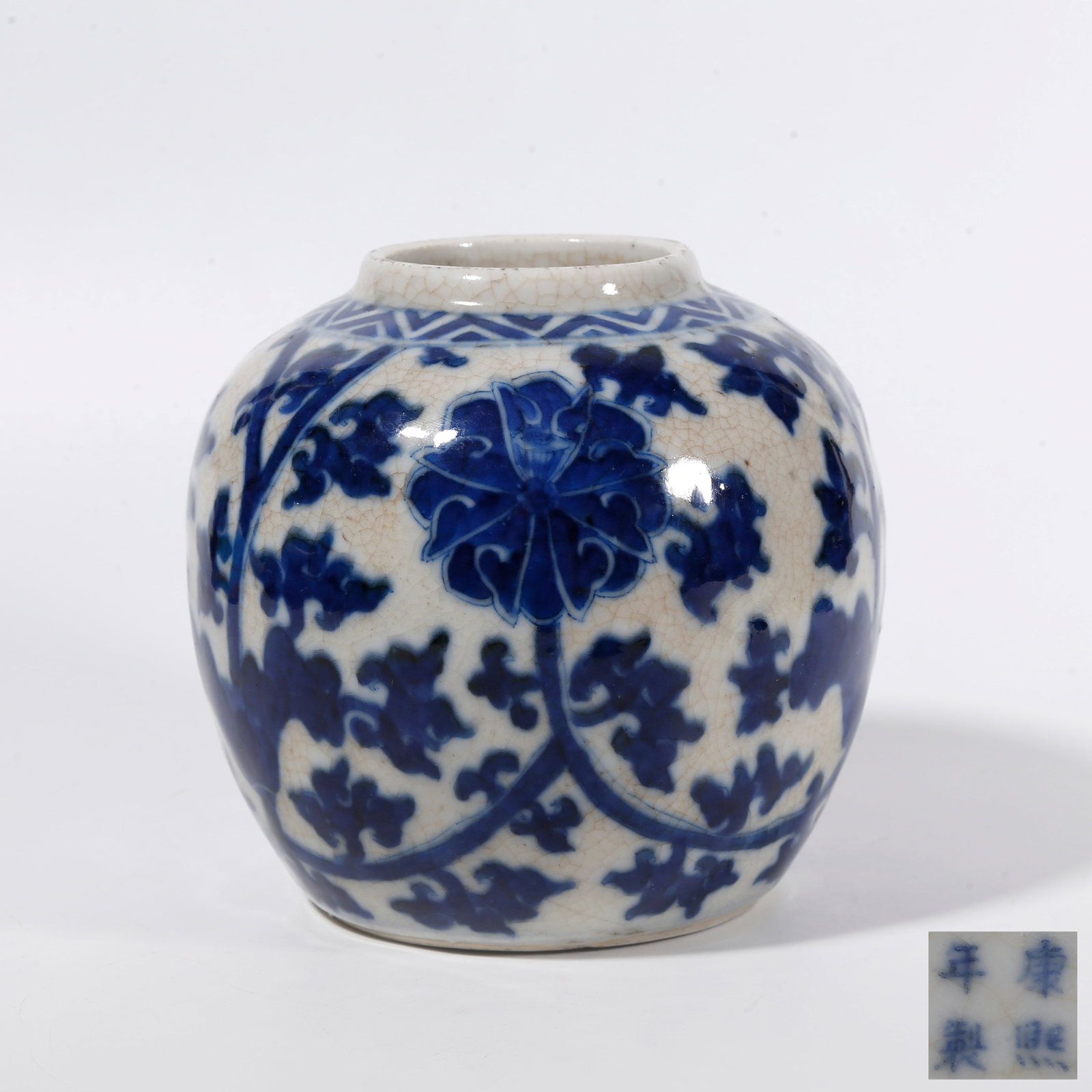 A BLUE AND WHITE JAR WITH FLORAL PATTERNS: Blue and White Jar with Floral Patterns