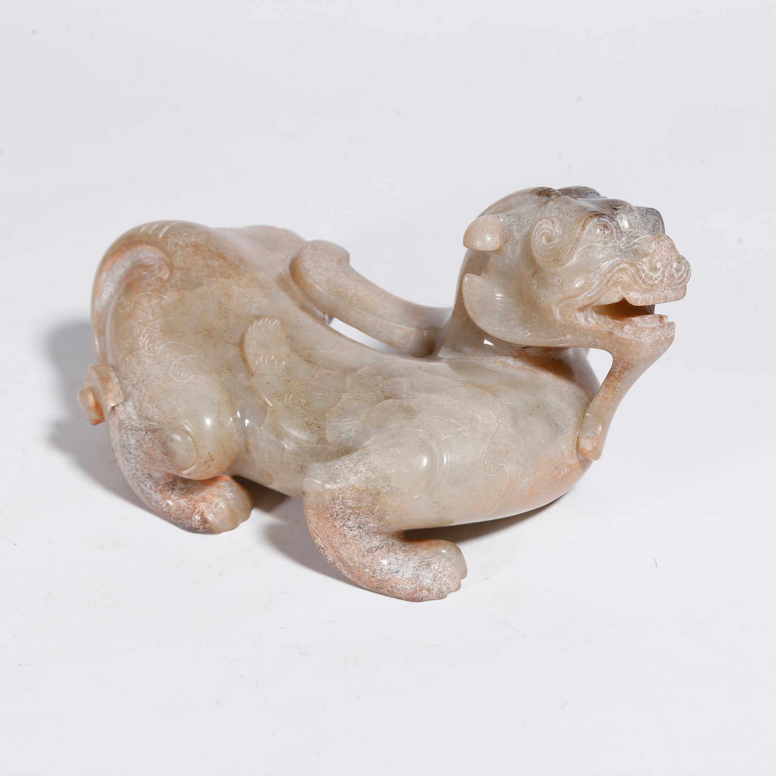 A HETIAN JADE BEAST-SHAPED ORNAMENT: Hetian Jade Beast-Shaped Ornament