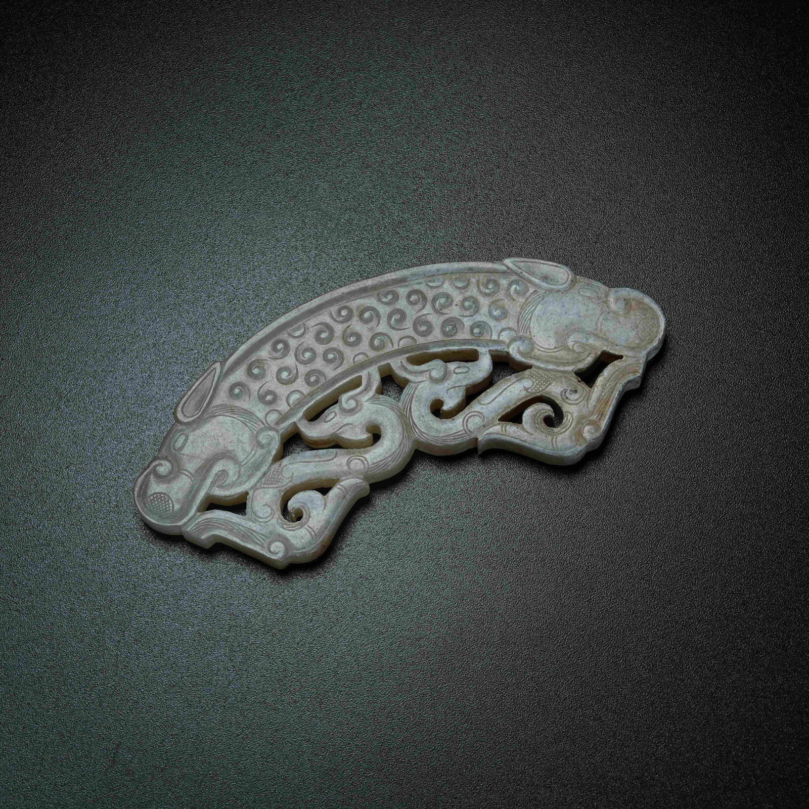 A ARCHAIC JADE HUANG ARC WITH BEAST HEAD: Archaic Jade Huang Arc with Beast Head