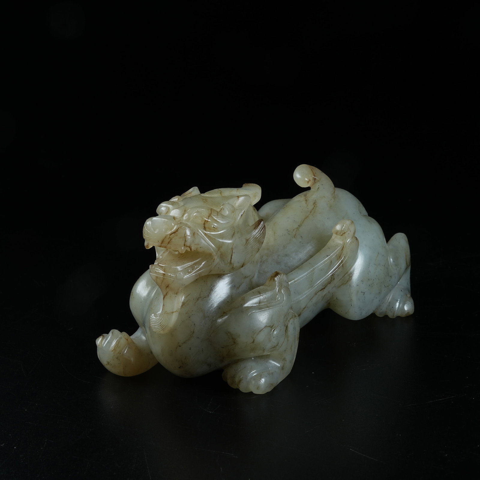 A ARCHAIC JADE AUSPICIOUS BEAST ORNAMENT: Archaic Jade Auspicious Beast Ornament