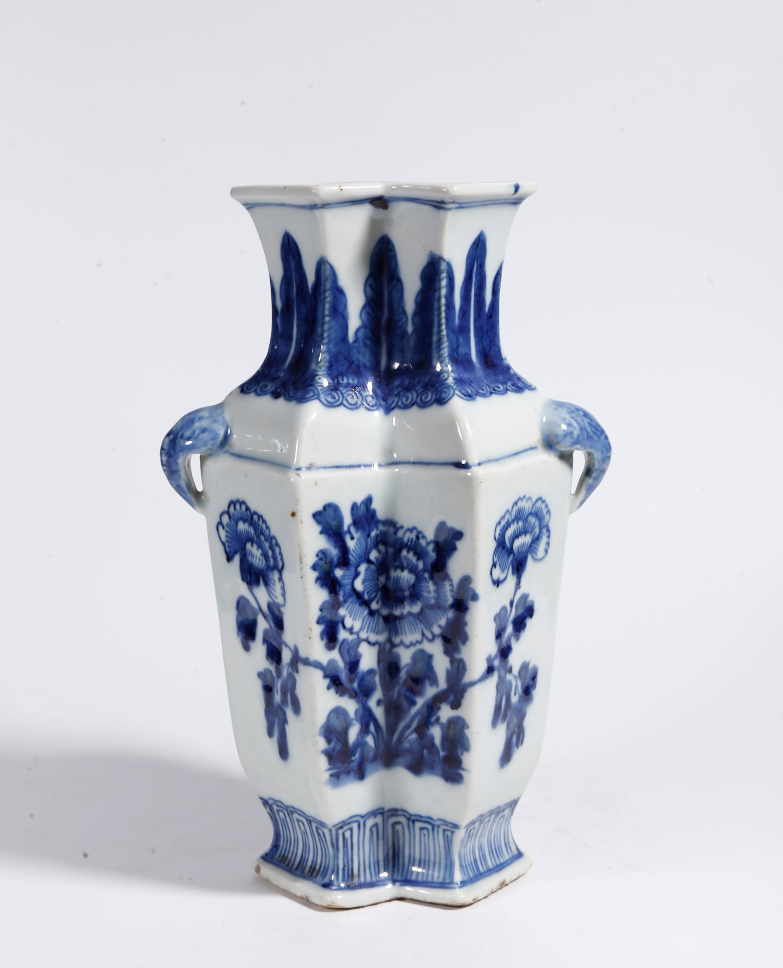 A BLUE AND WHITE VASE WITH FLORAL PATTERN AND DOUBLE ELEPHANT EARS: Blue and White Vase with Floral Pattern and Double Elephant Ears