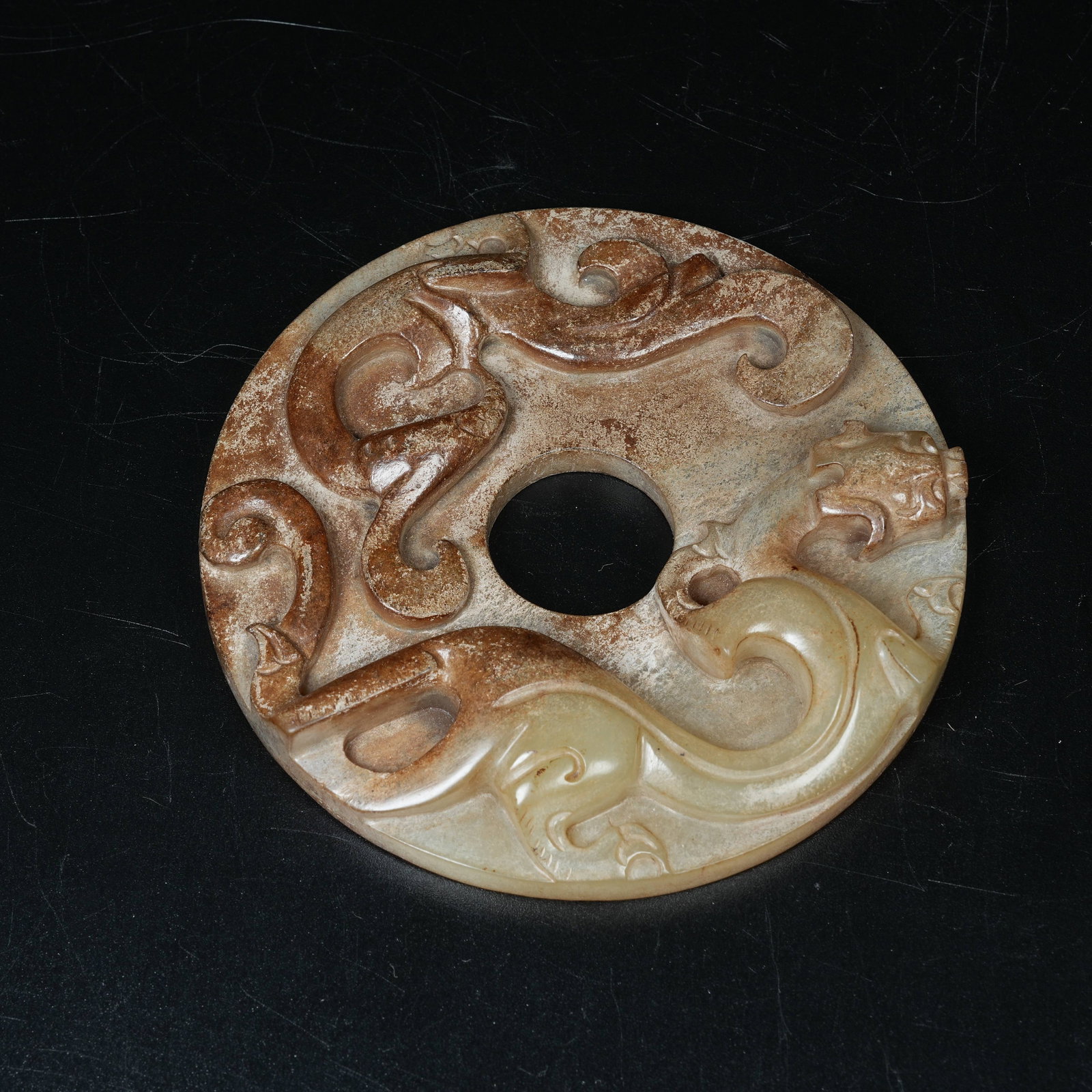 A ARCHAIC JADE BI DISC WITH CHILONG MOTIFS: Archaic Jade Bi Disc with Chilong Motifs