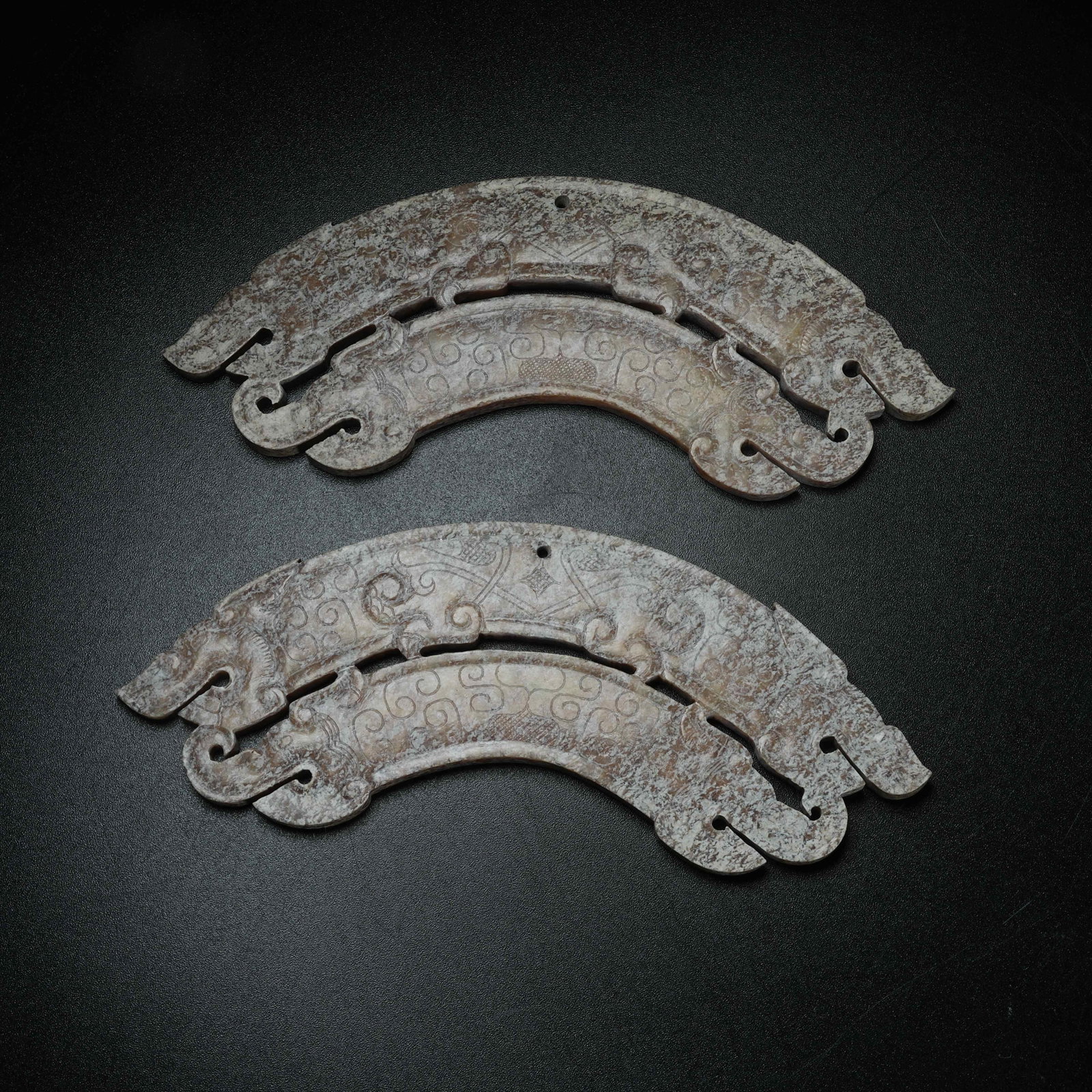 A SET OF ARCHAIC JADE HUANG ARCS WITH BEAST PATTERN: Set of Archaic Jade Huang Arcs with Beast Pattern