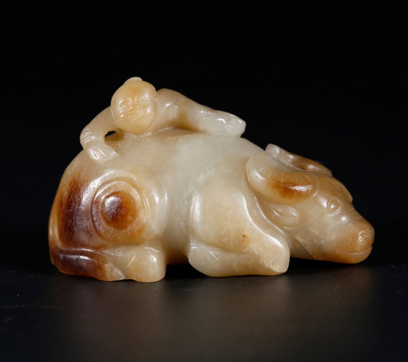 A HETIAN JADE CARVED ORNAMENT OF BOY HERDING OX: Hetian Jade Carved Ornament of Boy Herding Ox